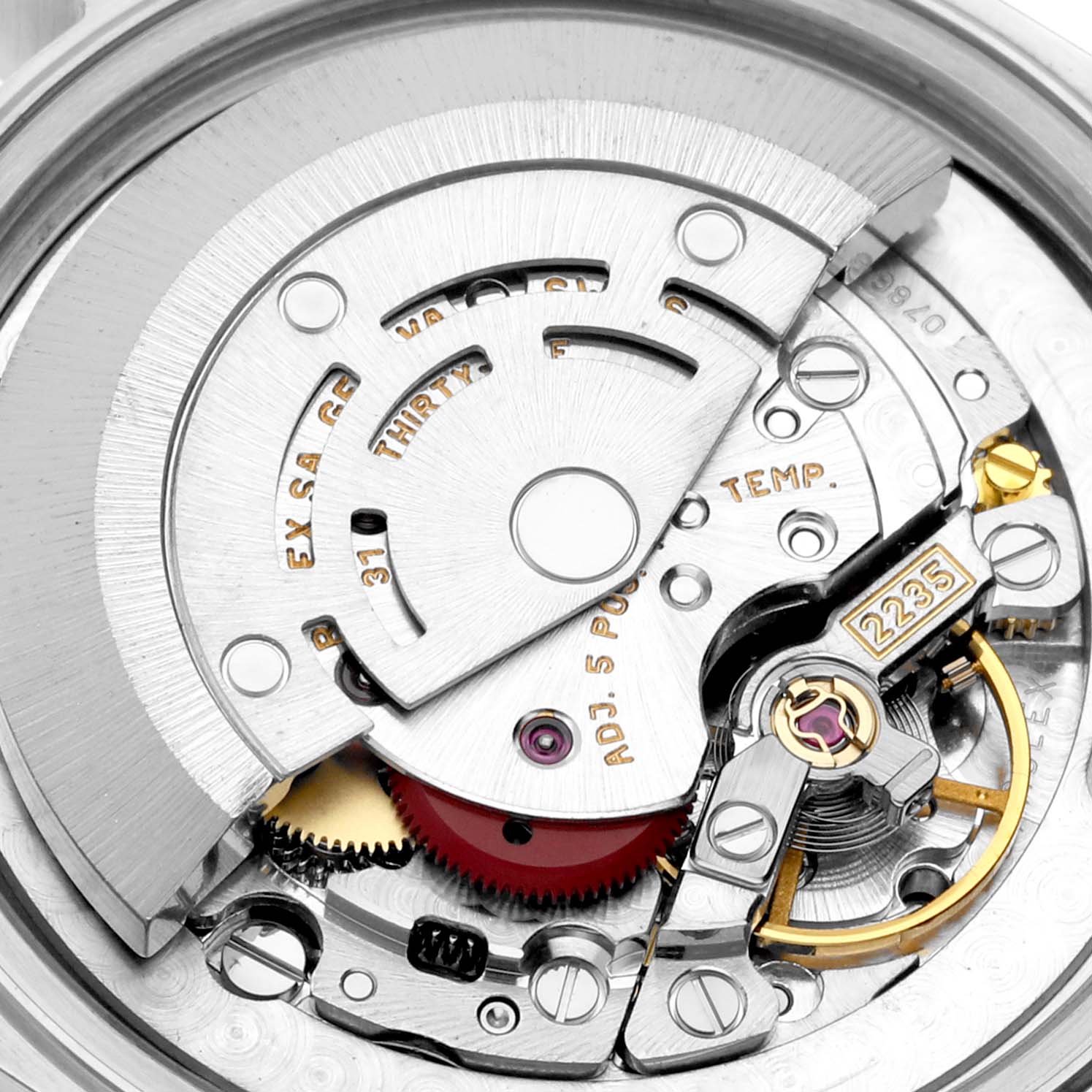This image shows a close-up of the internal movement mechanism of a Mid-Size model Rolex watch.