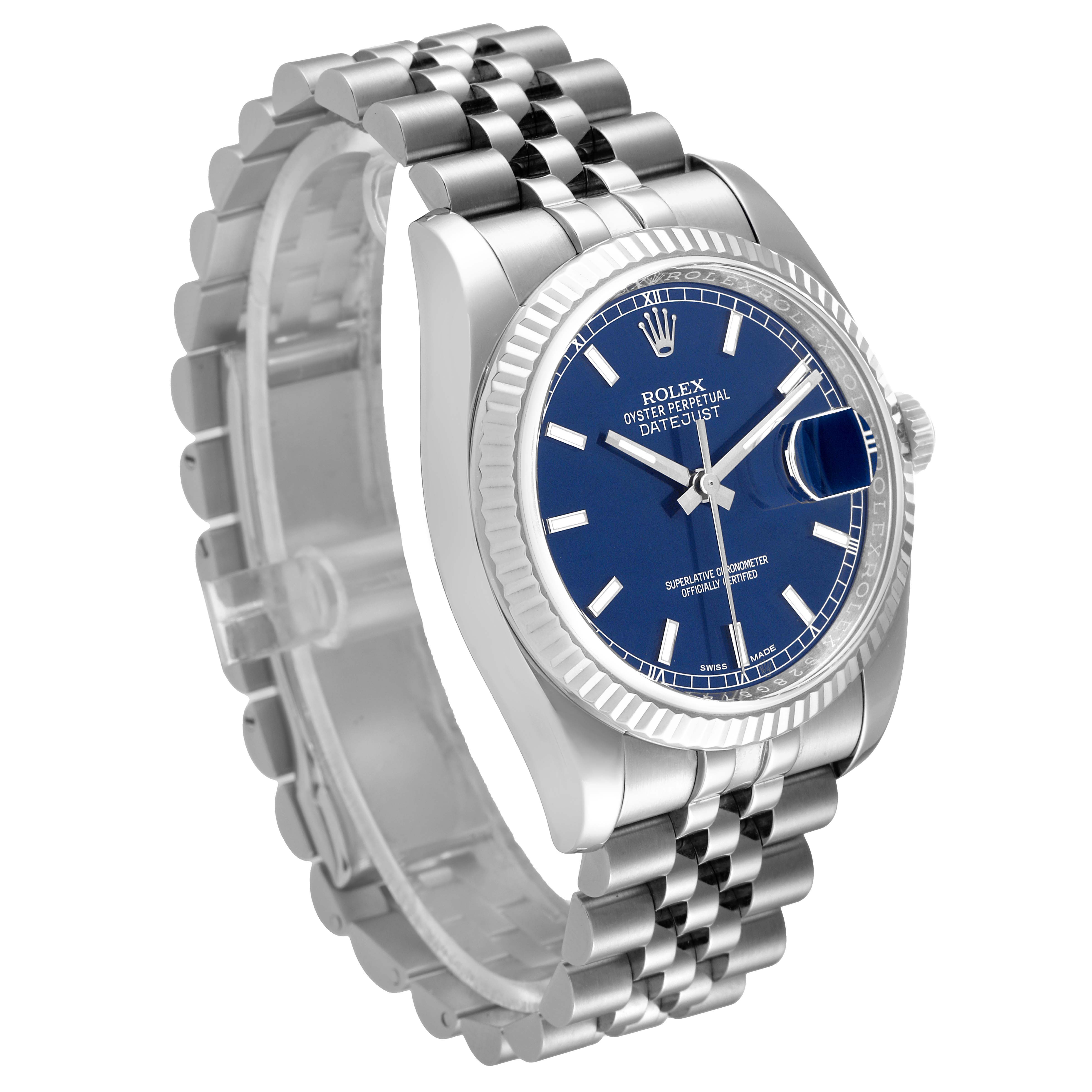 This image is of a Rolex Datejust 116234 Men's Stainless Steel Blue Dial 116234 Men's Stainless Steel Blue Dial watch, showcasing its face, fluted bezel, crown, and jubilee bracelet from an angled side view.