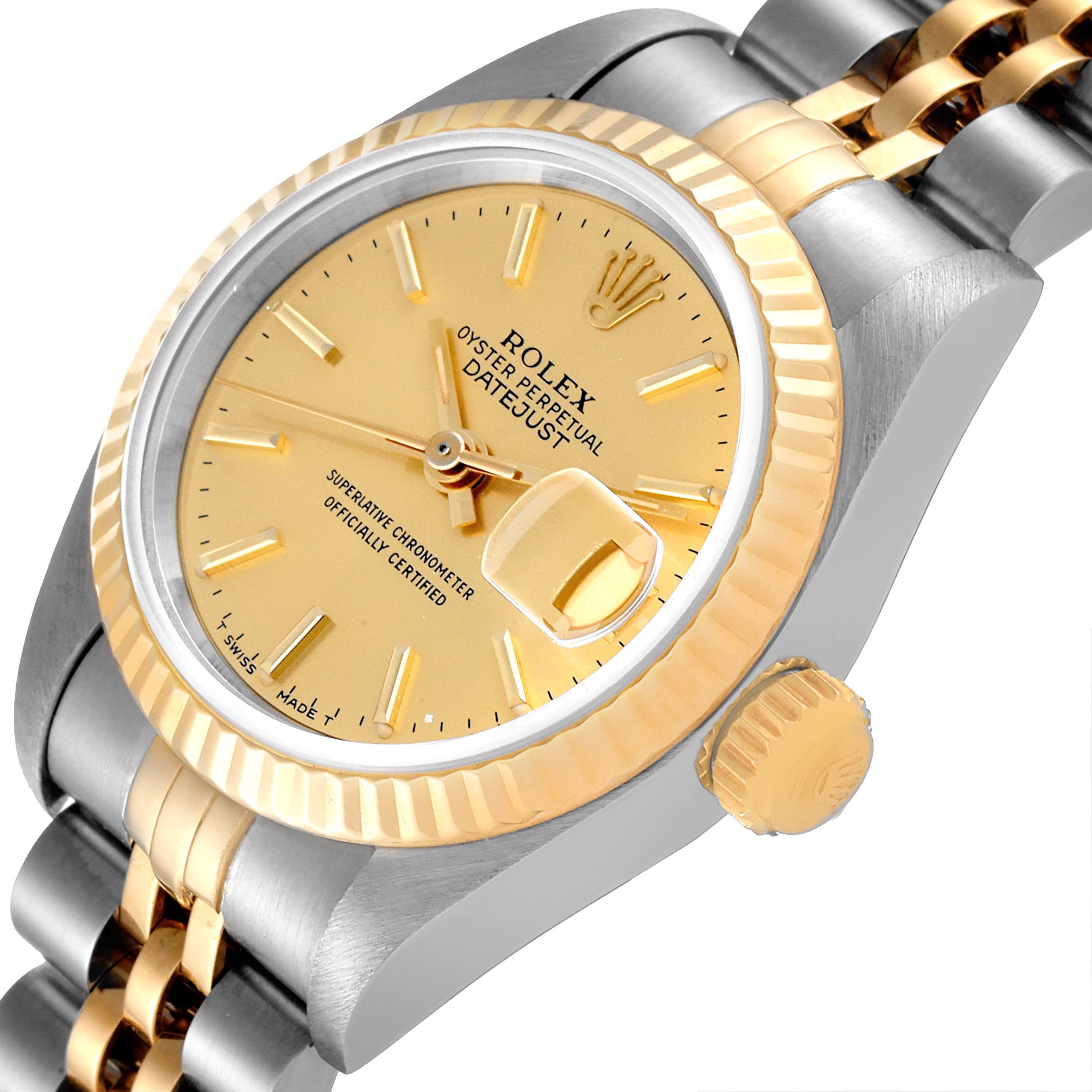 The image shows a close-up angle of a Rolex Datejust 69173 Women
s Steel and Gold (two tone) Champagne Dial 69173 Women
s Steel and Gold (two tone) Champagne Dial watch, highlighting the dial, bezel, crown, and part of the bracelet.