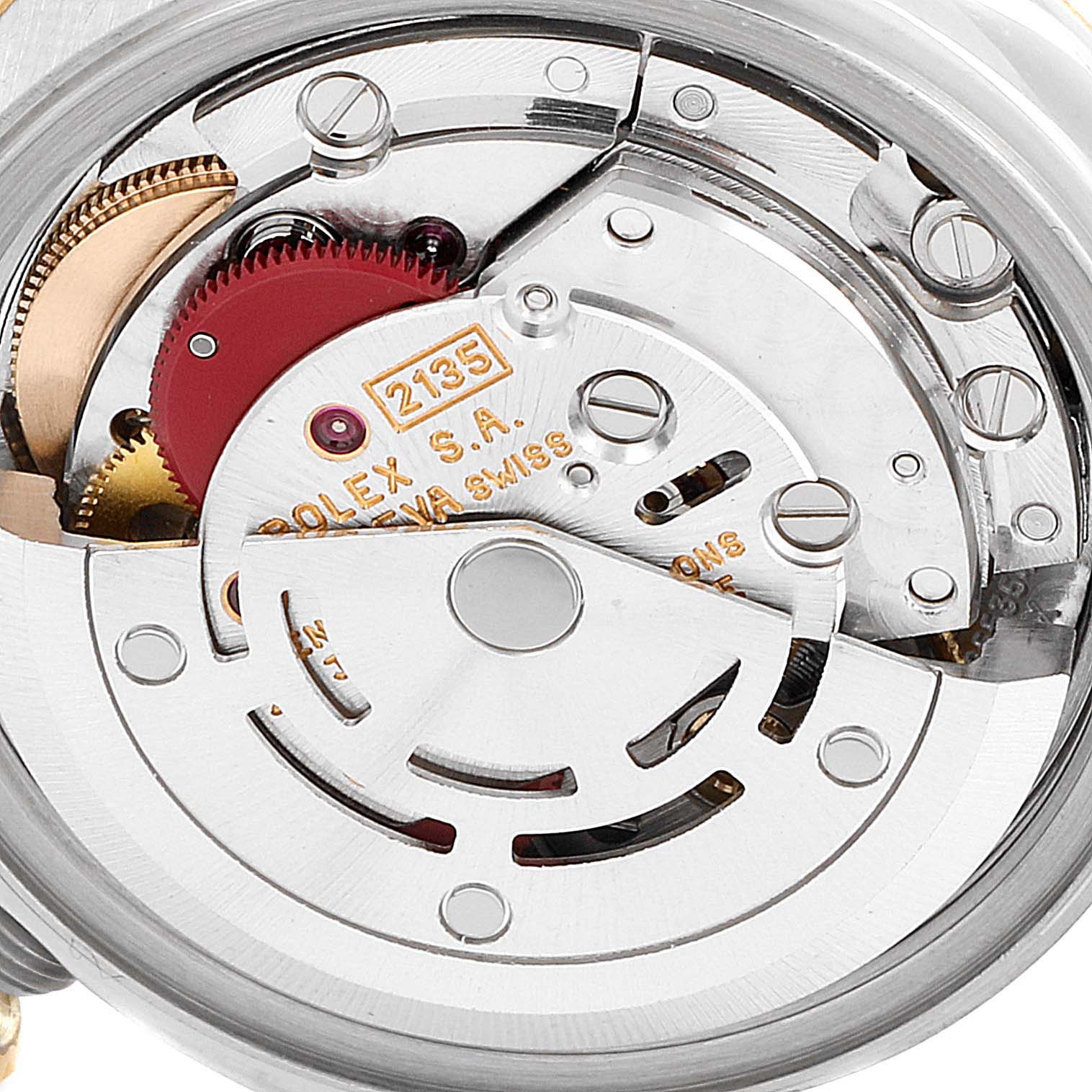 The image shows a close-up of the movement mechanism of a Rolex Datejust 69173 Women
s Steel and Gold (two tone) Champagne Dial 69173 Women
s Steel and Gold (two tone) Champagne Dial watch model.
