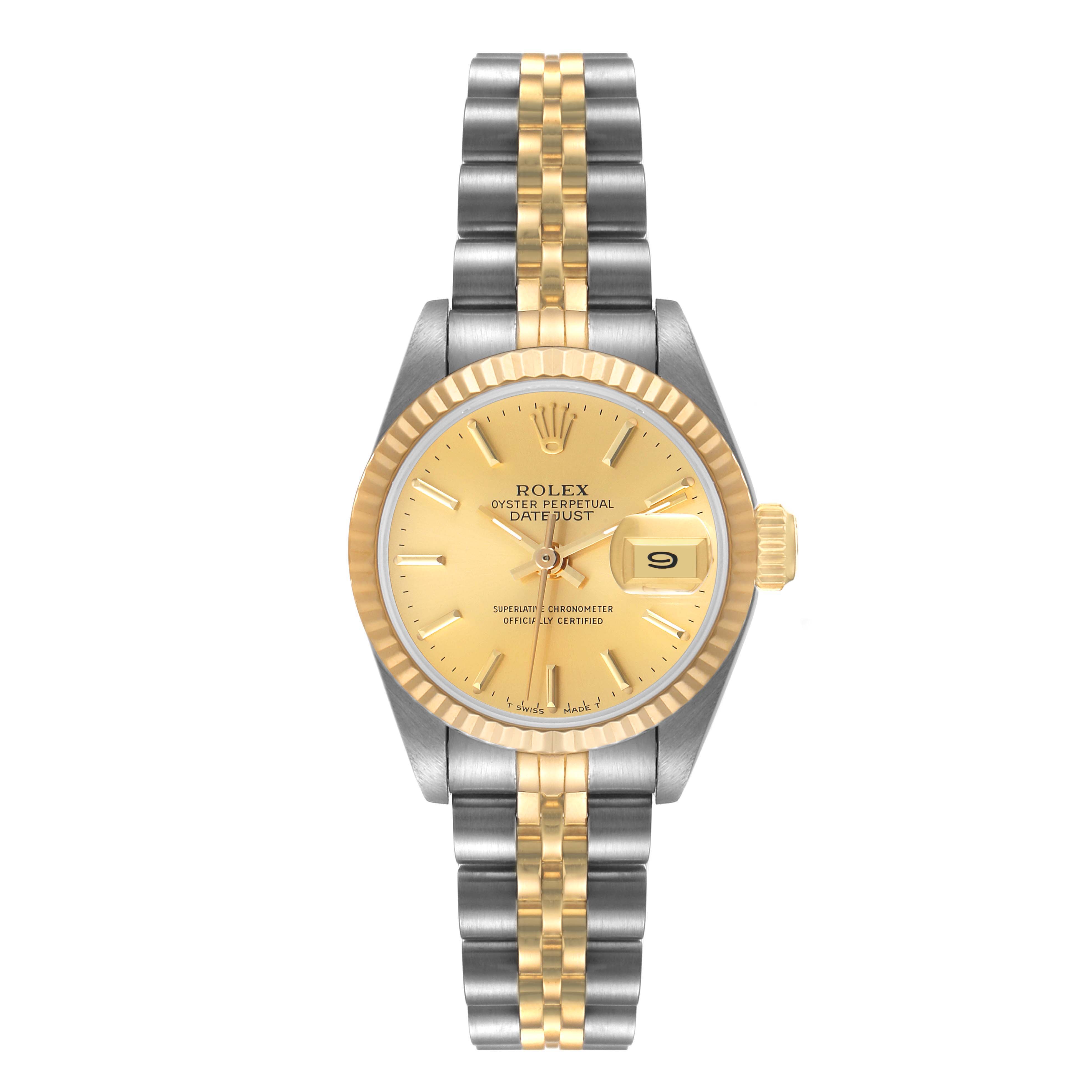 The image shows a front view of a Rolex Datejust 69173 Women
s Steel and Gold (two tone) Champagne Dial 69173 Women
s Steel and Gold (two tone) Champagne Dial watch featuring a gold dial, fluted bezel, and a two-tone metal bracelet.