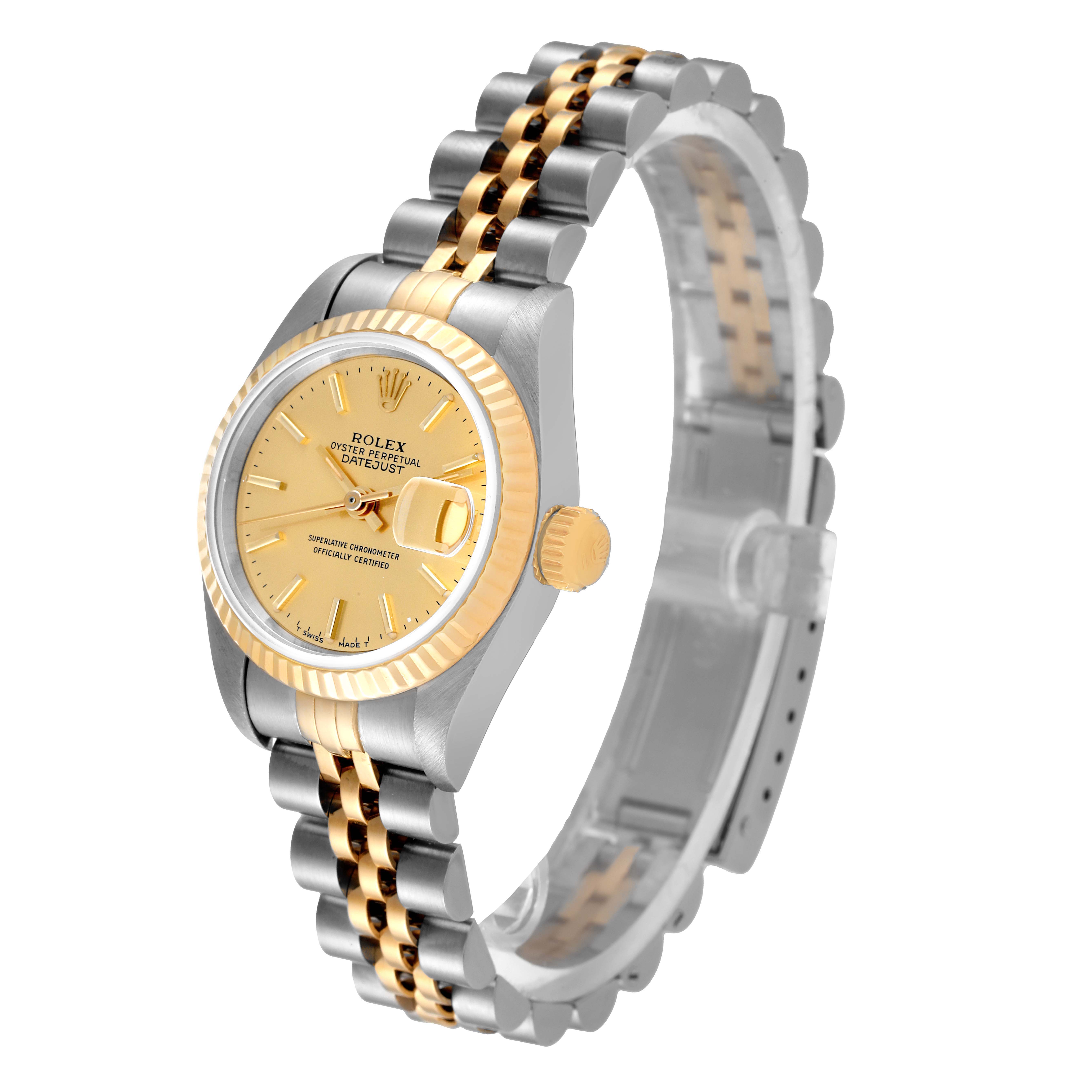 The image shows the Rolex Datejust 69173 Women
s Steel and Gold (two tone) Champagne Dial 69173 Women
s Steel and Gold (two tone) Champagne Dial watch at an angle highlighting its gold and silver band, bezel, crown, and champagne dial.