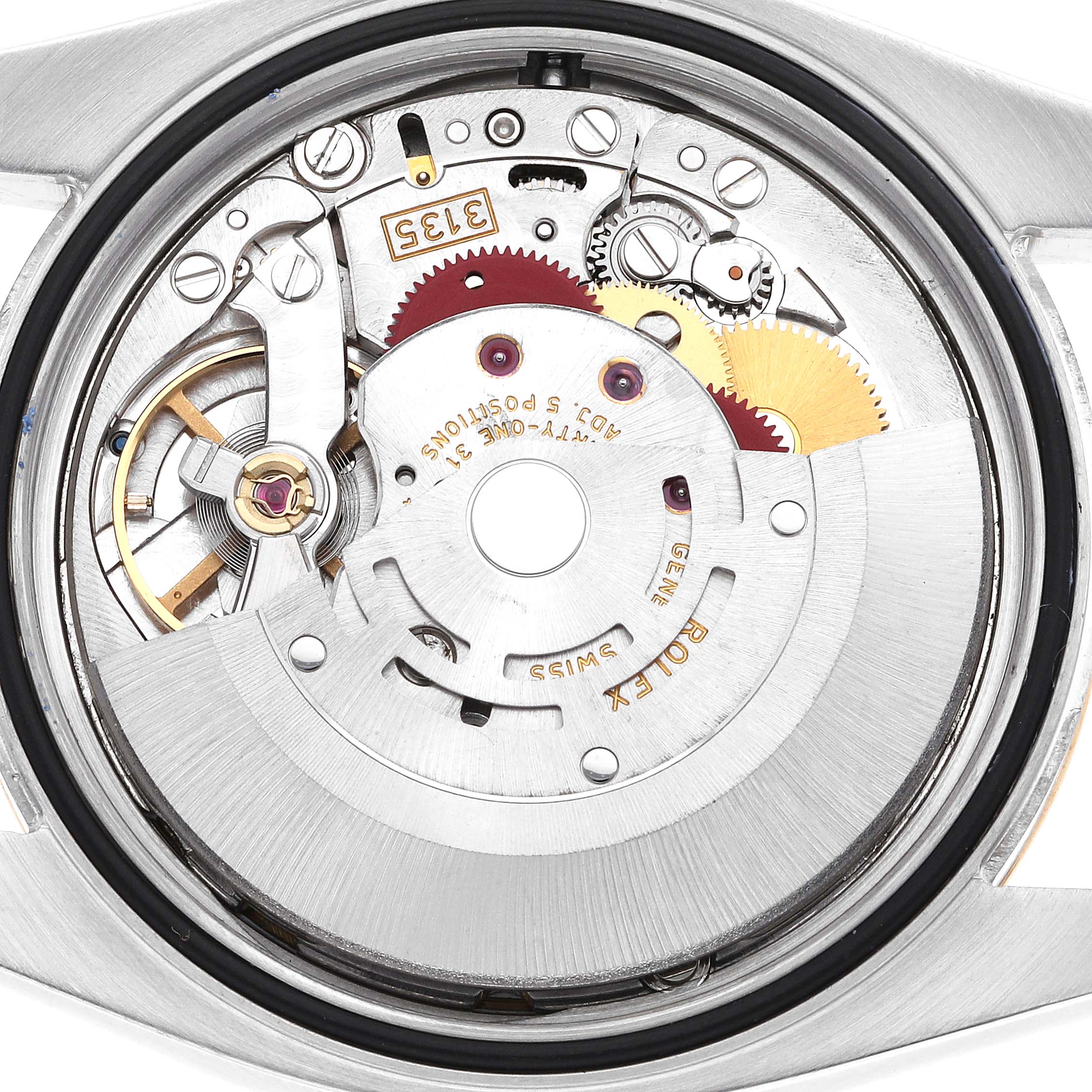 This image shows the internal mechanism of a Rolex Datejust 116233 Men's Steel and Gold (two tone) Mother of Pearl Dial 116233 Men's Steel and Gold (two tone) Mother of Pearl Dial watch taken from a rear angle displaying gears and the balance wheel.