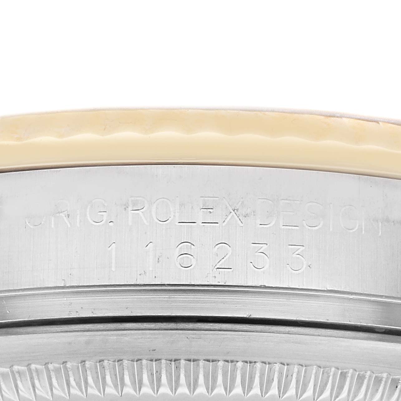 This image shows a close-up view of the model number engraving on the case side of the Rolex Datejust 116233 Men's Steel and Gold (two tone) Mother of Pearl Dial 116233 Men's Steel and Gold (two tone) Mother of Pearl Dial watch.