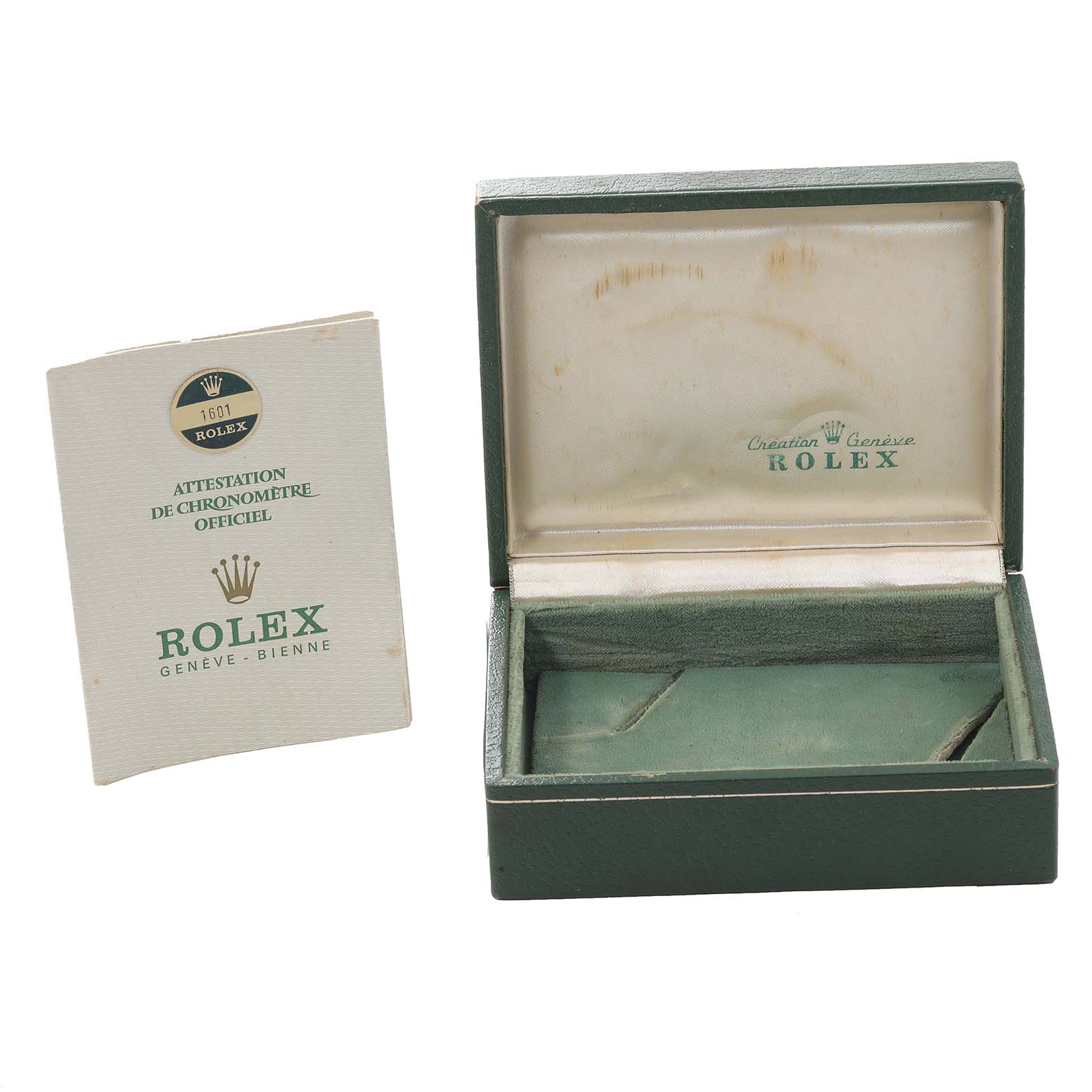 The image shows an open Rolex Vintage Collection 1601 Men's Steel and Gold (two tone) Silver Dial 1601 Men's Steel and Gold (two tone) Silver Dial watch box and an official attestation booklet.