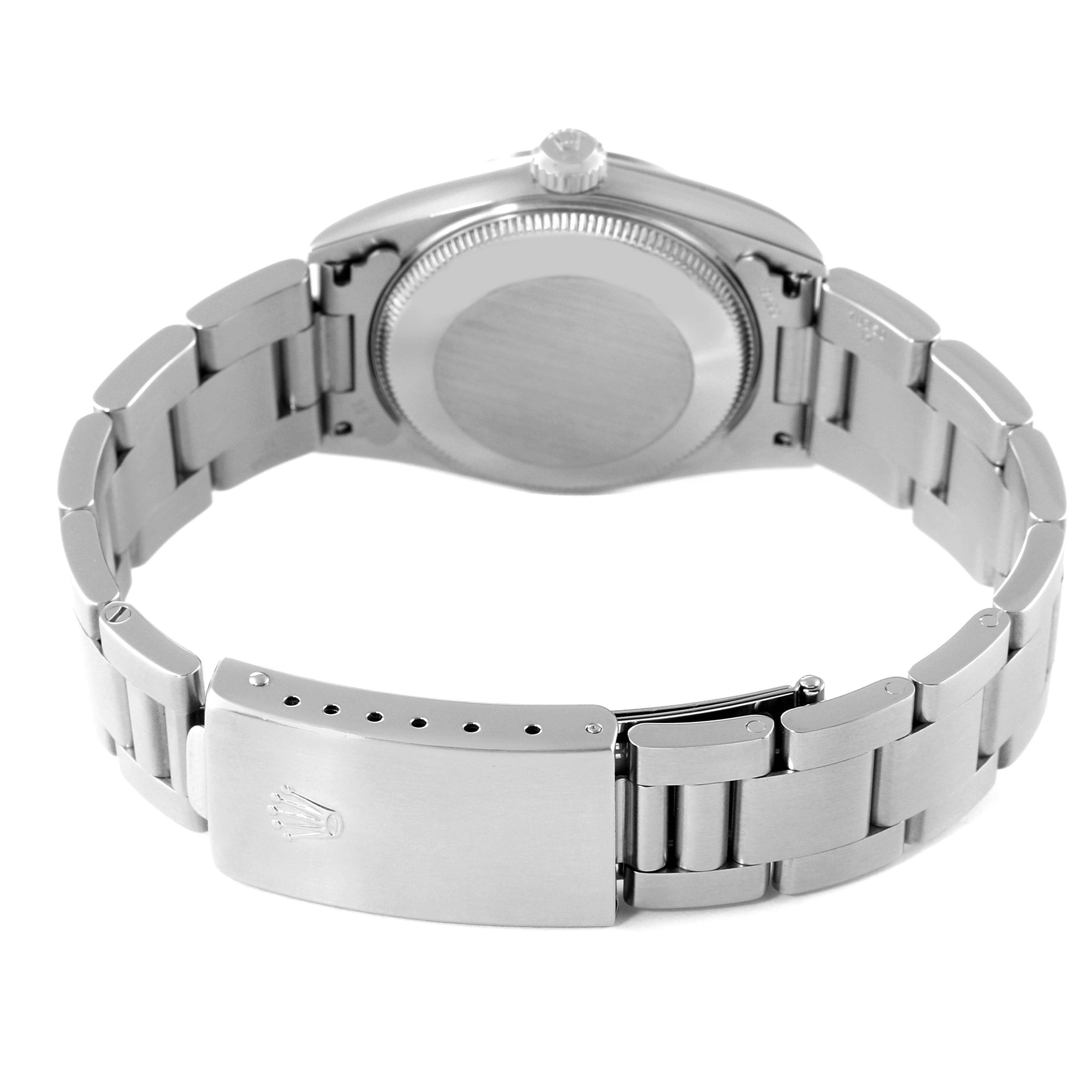 The image shows the back case, bracelet, and clasp of a Rolex Mid-Size 77080 Women's Stainless Steel Blue Dial 77080 Women's Stainless Steel Blue Dial watch from a rear angle.