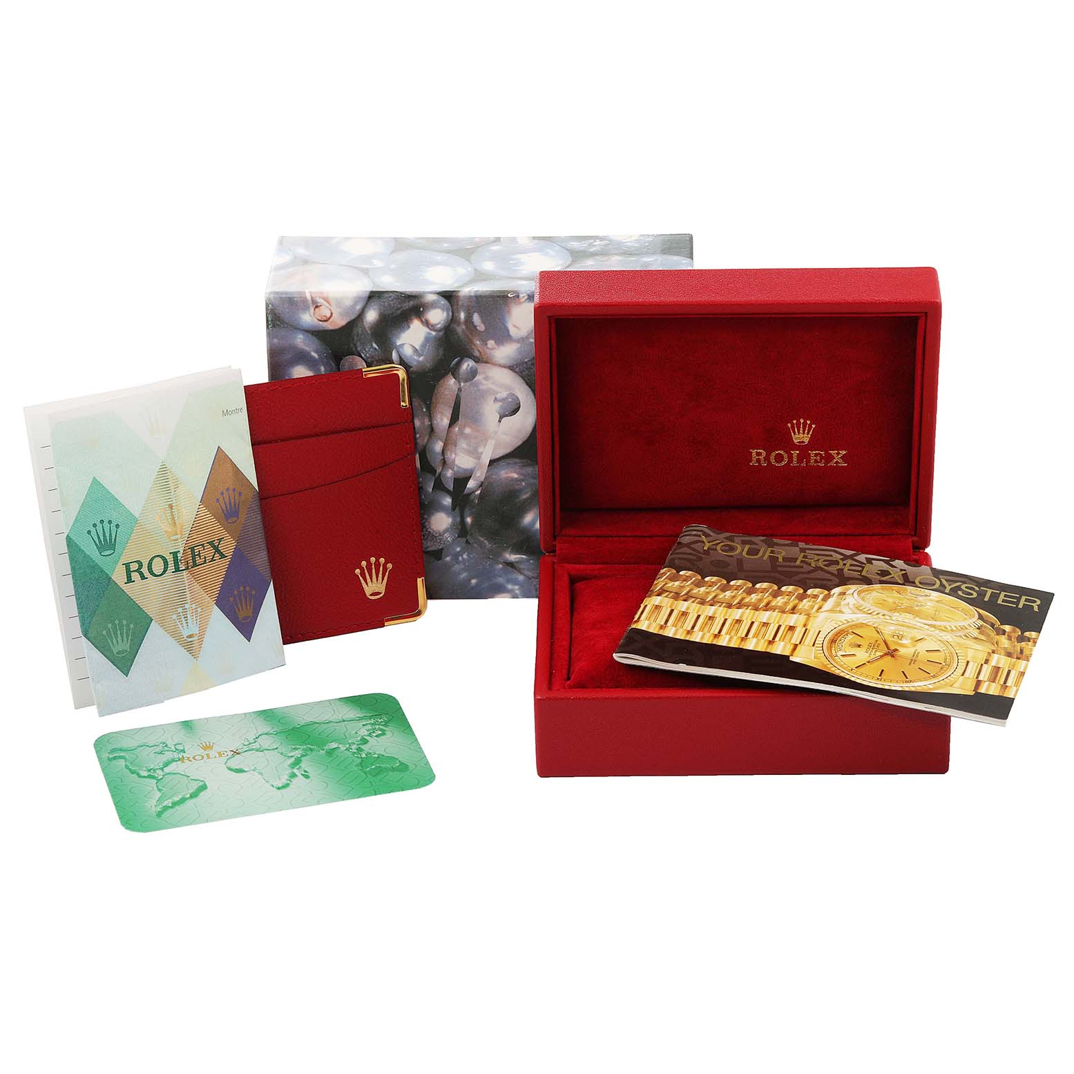 The image shows the packaging and accessories for a Rolex Mid-Size 77080 Women's Stainless Steel Blue Dial 77080 Women's Stainless Steel Blue Dial model, including manuals, a card holder, and the watch box.