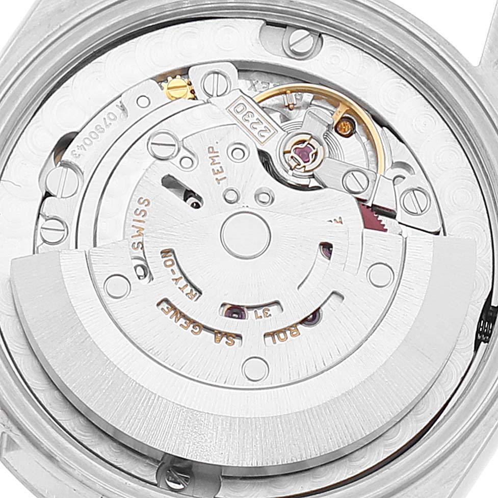 This image shows the internal movement mechanism of the Rolex Mid-Size 77080 Women's Stainless Steel Blue Dial 77080 Women's Stainless Steel Blue Dial model viewed from the back.