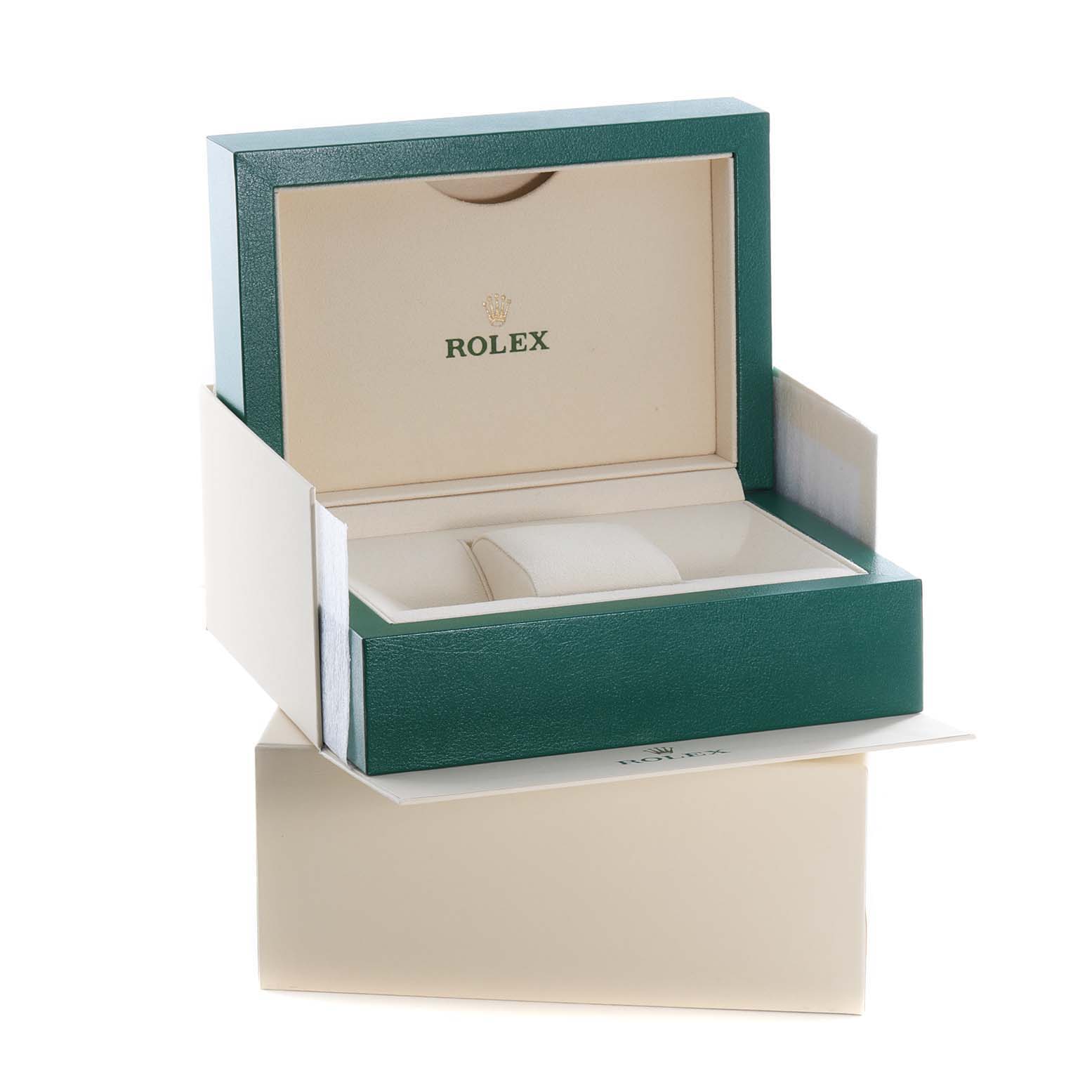 The image shows the opened packaging box for a Rolex Milgauss 116400GV Men
s Stainless Steel Blue Dial 116400GV Men
s Stainless Steel Blue Dial watch, with an empty watch cushion inside.