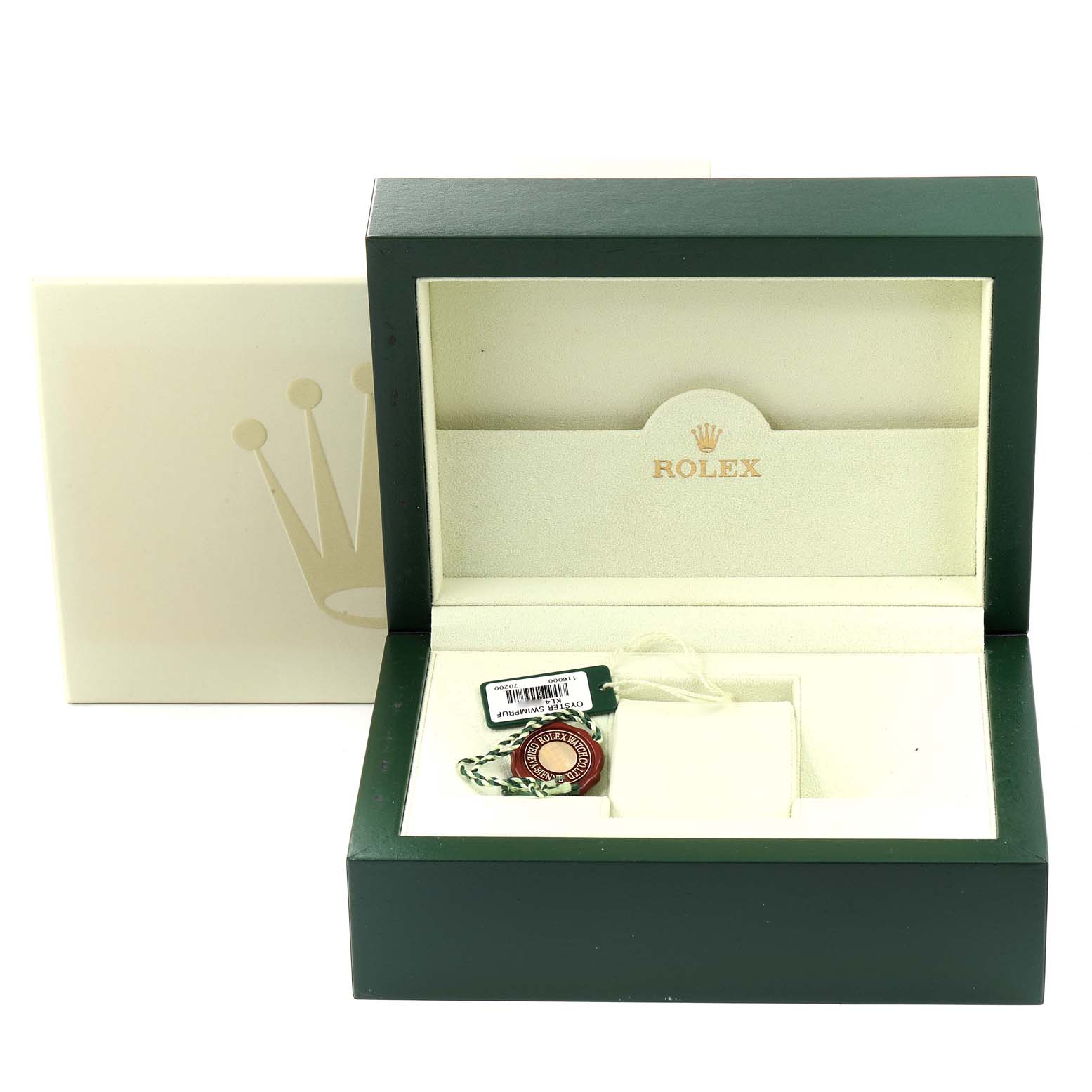 The image shows an empty Rolex Oyster Perpetual 116000 Men's Stainless Steel Blue Dial 116000 Men's Stainless Steel Blue Dial watch box with tags inside.