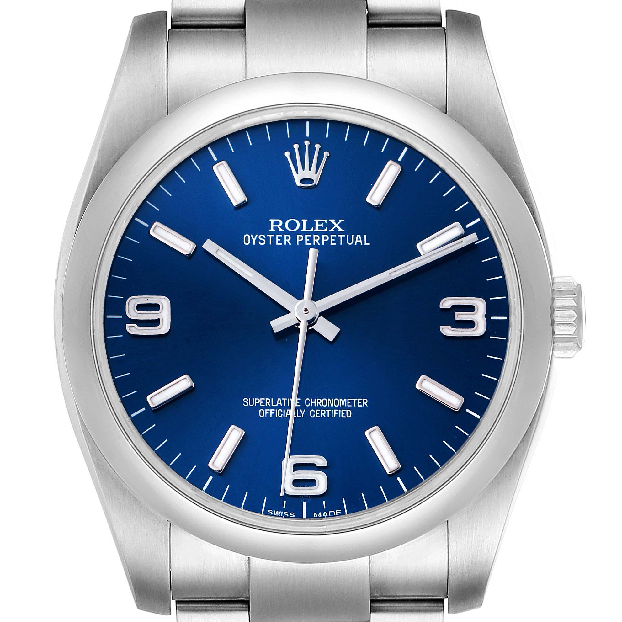 This image shows a front-facing view of a Rolex Oyster Perpetual 116000 Men's Stainless Steel Blue Dial 116000 Men's Stainless Steel Blue Dial watch with a blue dial and silver bracelet.