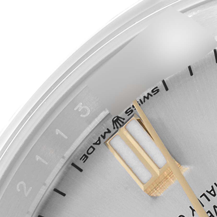 The image shows a close-up of the dial and markers of the Rolex Oyster Perpetual 126000 Men's Stainless Steel Silver Dial 126000 Men's Stainless Steel Silver Dial watch, focusing on the 3 o'clock position.