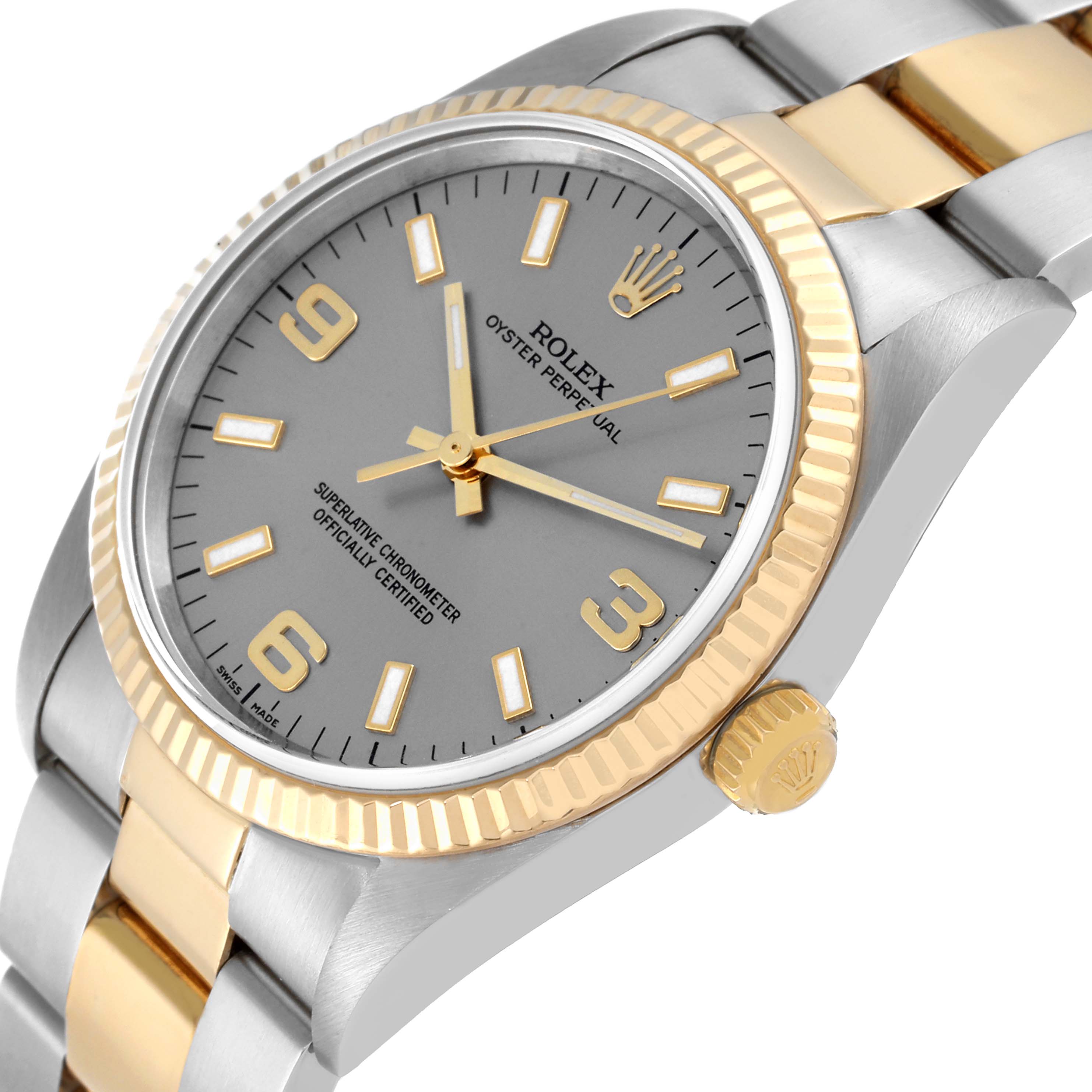 This image shows the face, bezel, crown, and bracelet of a Rolex Oyster Perpetual 14233 Men's Steel and Gold (two tone) Grey Dial 14233 Men's Steel and Gold (two tone) Grey Dial watch at an angled side view.