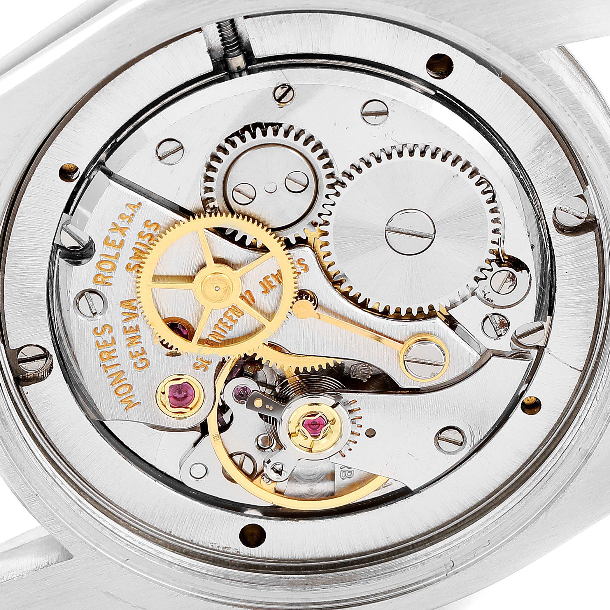 The image shows the intricate internal mechanism of the Rolex Vintage Collection 6694 Men's Stainless Steel Black Dial 6694 Men's Stainless Steel Black Dial watch from a close-up, back view angle.