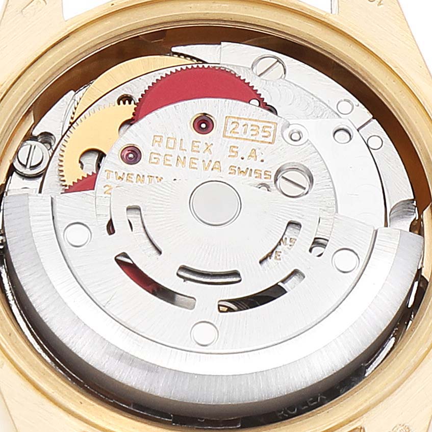 This image shows the inner mechanical movement of the Rolex President 69178 Women
s Yellow Gold White Dial 69178 Women
s Yellow Gold White Dial model watch, viewed from the back.