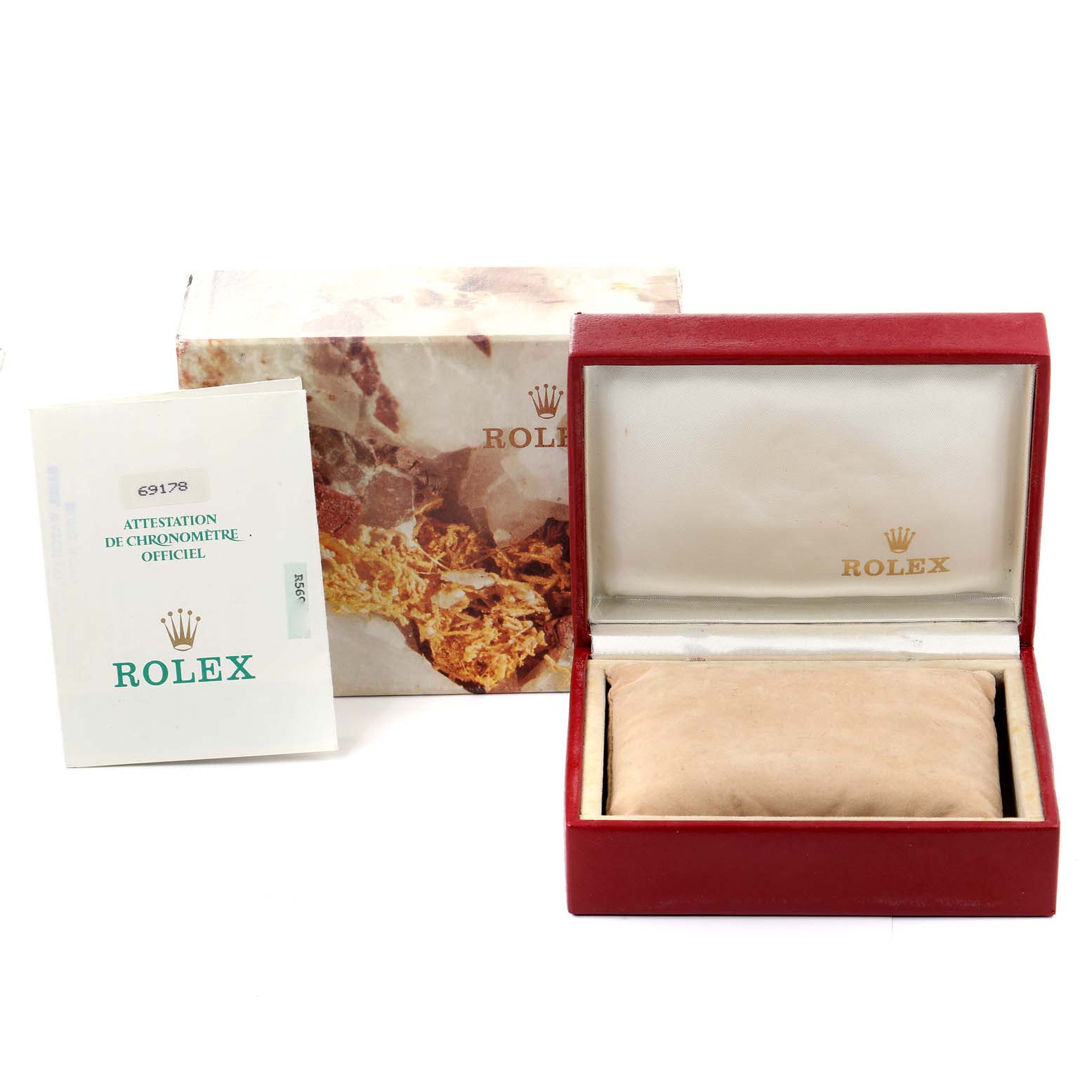 This image shows the packaging, manual, and red box for a Rolex President 69178 Women
s Yellow Gold White Dial 69178 Women
s Yellow Gold White Dial model watch.