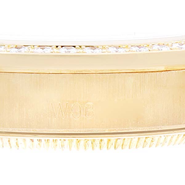 This close-up image shows the side of the bezel and case of a Rolex President 68288 Women
s Yellow Gold Champagne Dial 68288 Women
s Yellow Gold Champagne Dial model watch.