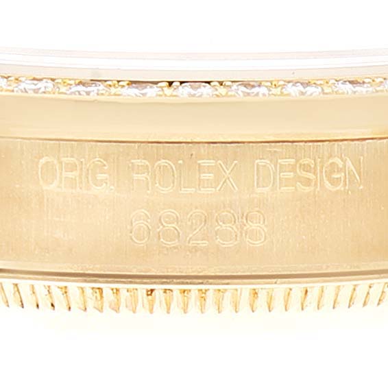 This close-up image shows the engraved model number, 68288, on the case side of a Rolex President 68288 Women
s Yellow Gold Champagne Dial 68288 Women
s Yellow Gold Champagne Dial watch.