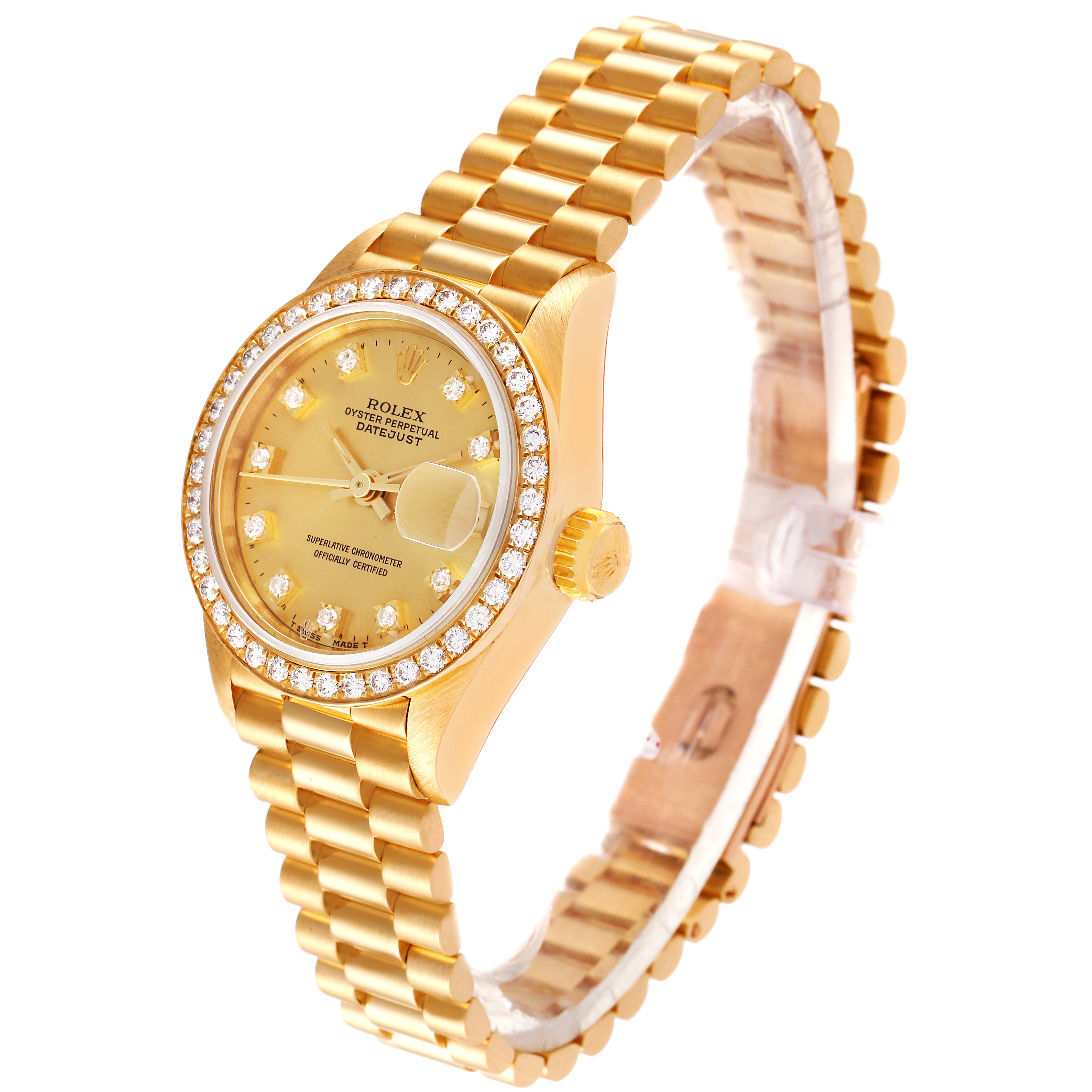 The Rolex President 69138 Women
s Yellow Gold Champagne Dial 69138 Women
s Yellow Gold Champagne Dial watch model is shown at an angle highlighting the gold case and bracelet with a diamond-encrusted bezel.