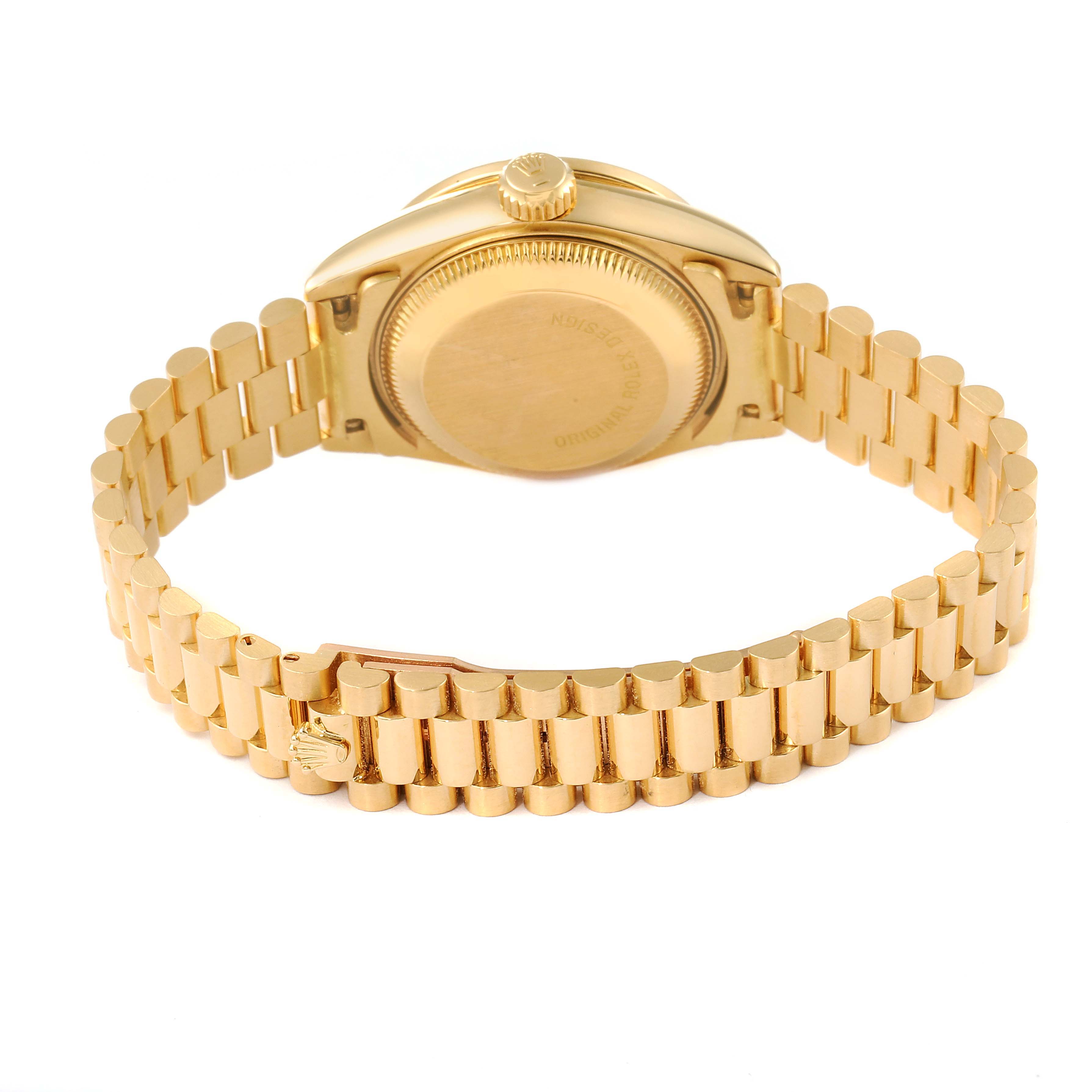 The image shows the back and bracelet of a Rolex President 69138 Women's Yellow Gold Champagne Dial 69138 Women's Yellow Gold Champagne Dial model watch from a rear angle.