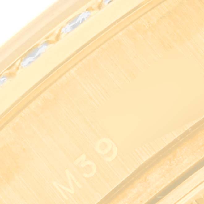 The image shows a close-up of the side engraving on the bracelet clasp of a Rolex President 179158 Women's Yellow Gold Champagne Dial 179158 Women's Yellow Gold Champagne Dial model watch.