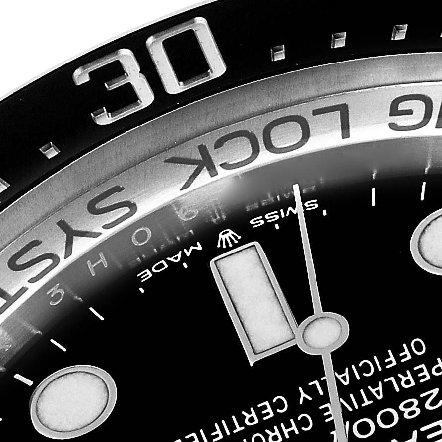 The image shows a close-up of the dial, bezel, and part of the face of the Rolex Sea-Dweller 126660 Men
s Stainless Steel Black Dial 126660 Men
s Stainless Steel Black Dial watch, highlighting details like the "0" at 30 and "RING LOCK SYSTEM."