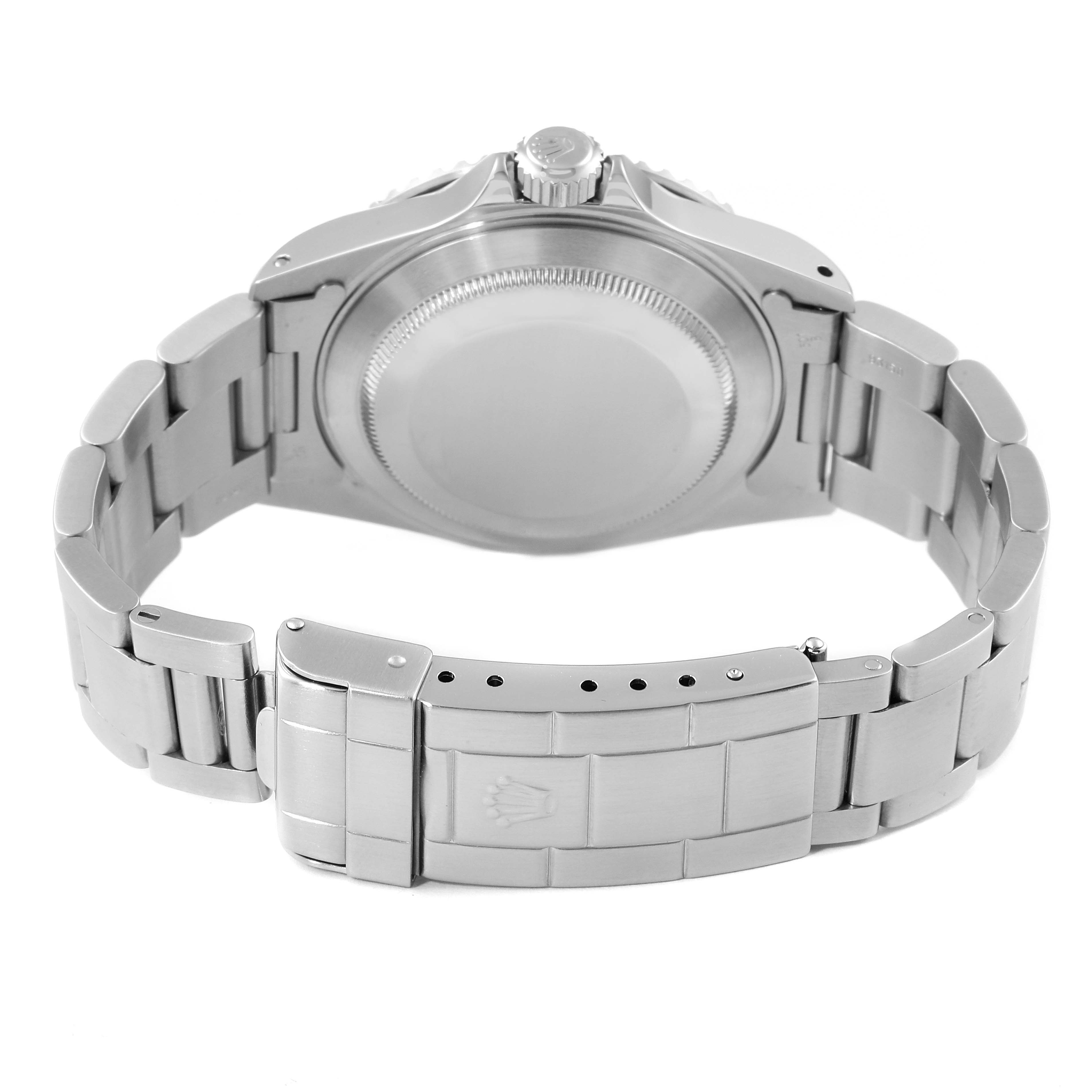 The image shows the back case and bracelet clasp of a Rolex Submariner 14060 Men
s Stainless Steel Black Dial 14060 Men
s Stainless Steel Black Dial watch from a rear view.