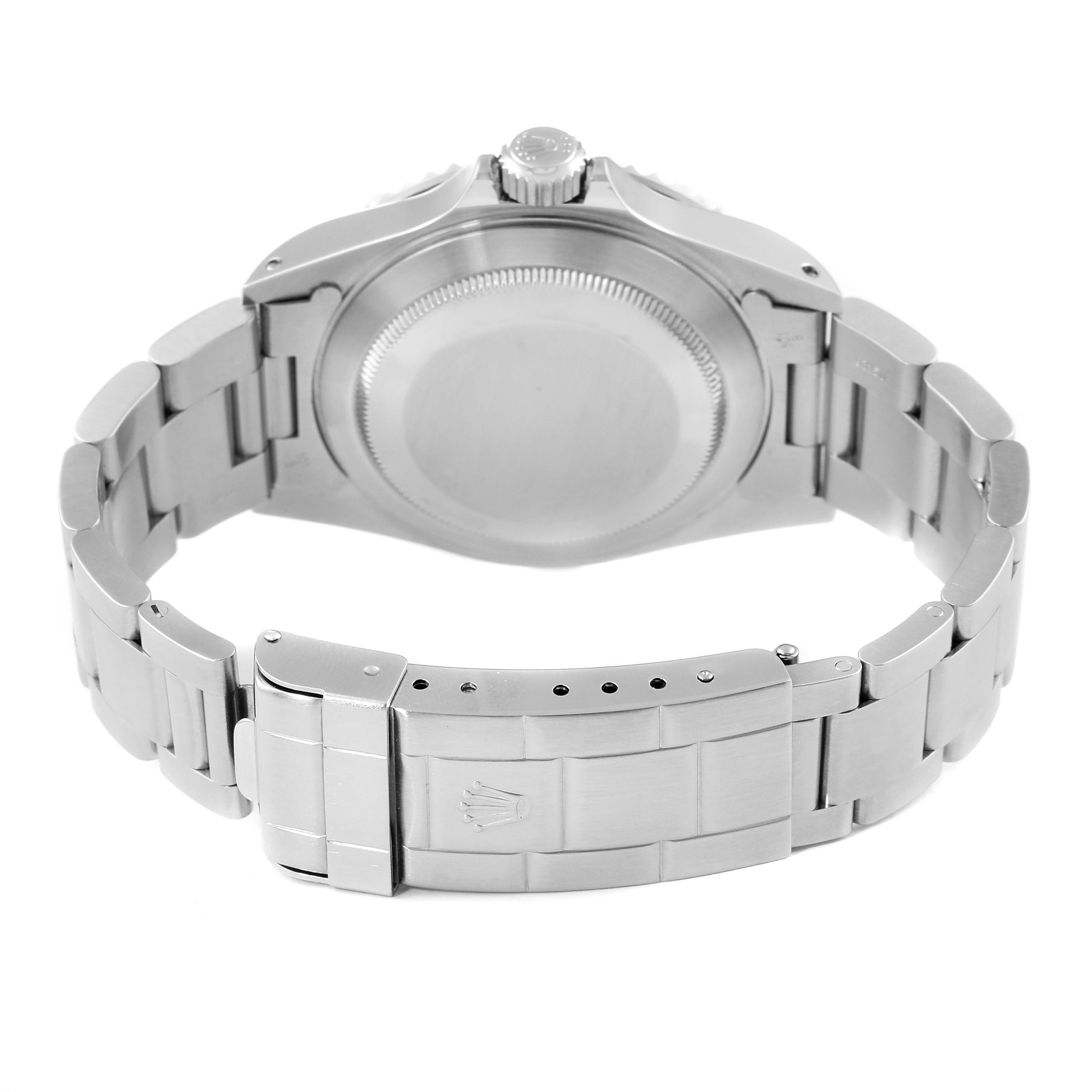 The image shows the back side of a Rolex Submariner 14060 Men's Stainless Steel Black Dial 14060 Men's Stainless Steel Black Dial watch, highlighting the case back and bracelet clasp.