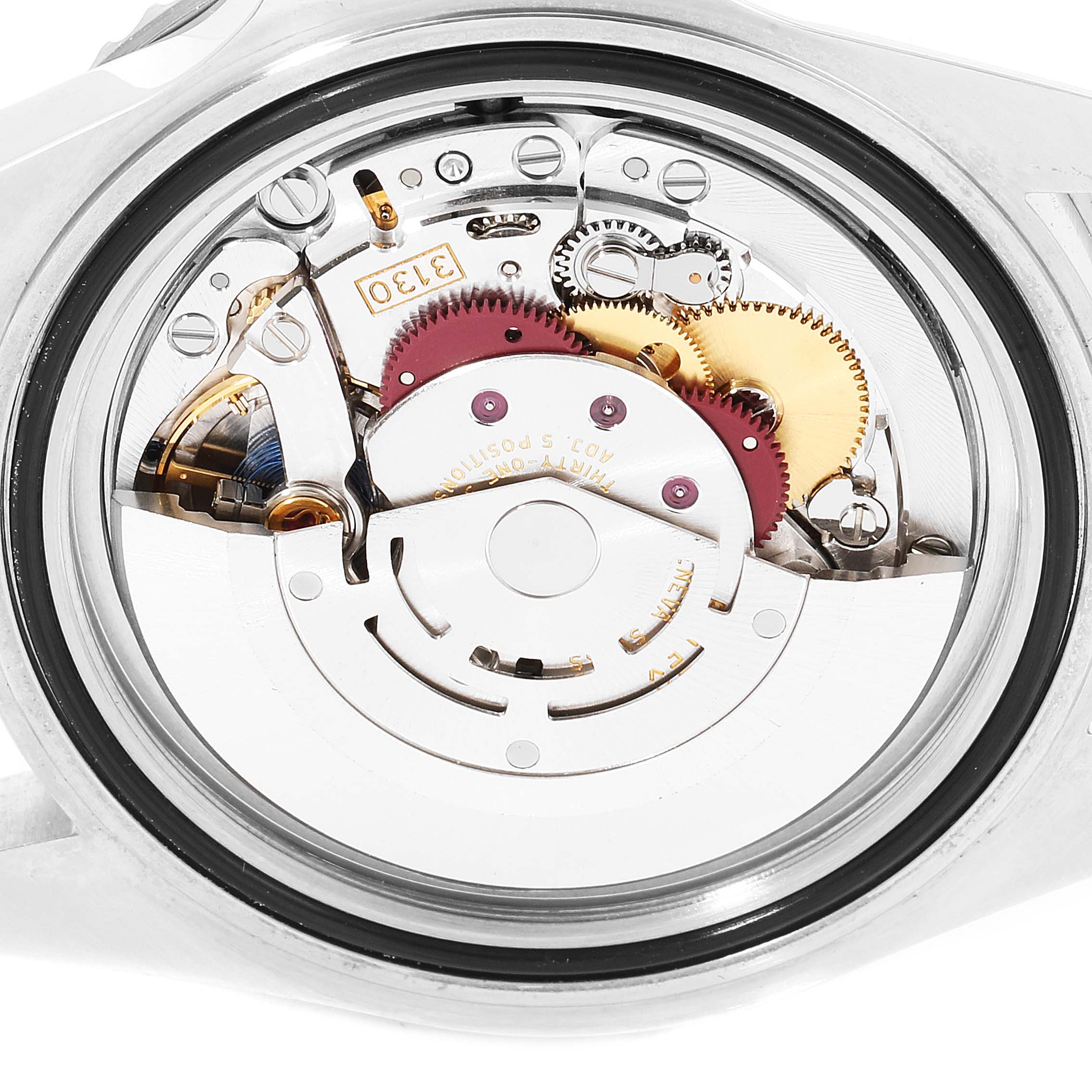 This image shows the internal mechanism and movement of a Rolex Submariner 14060 Men's Stainless Steel Black Dial 14060 Men's Stainless Steel Black Dial watch from a close-up, backside angle.