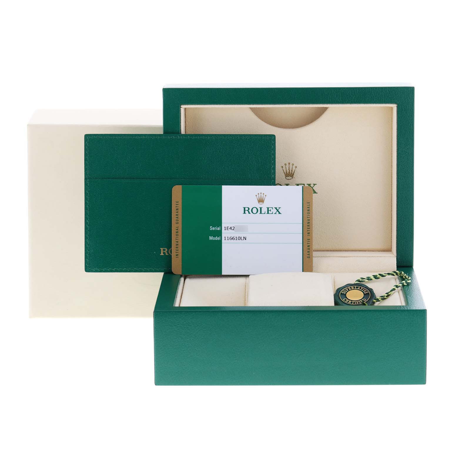 The image shows the packaging, warranty card, and green hang tag of a Rolex Submariner 116610LN Men
s Stainless Steel Black Dial 116610LN Men
s Stainless Steel Black Dial model watch.