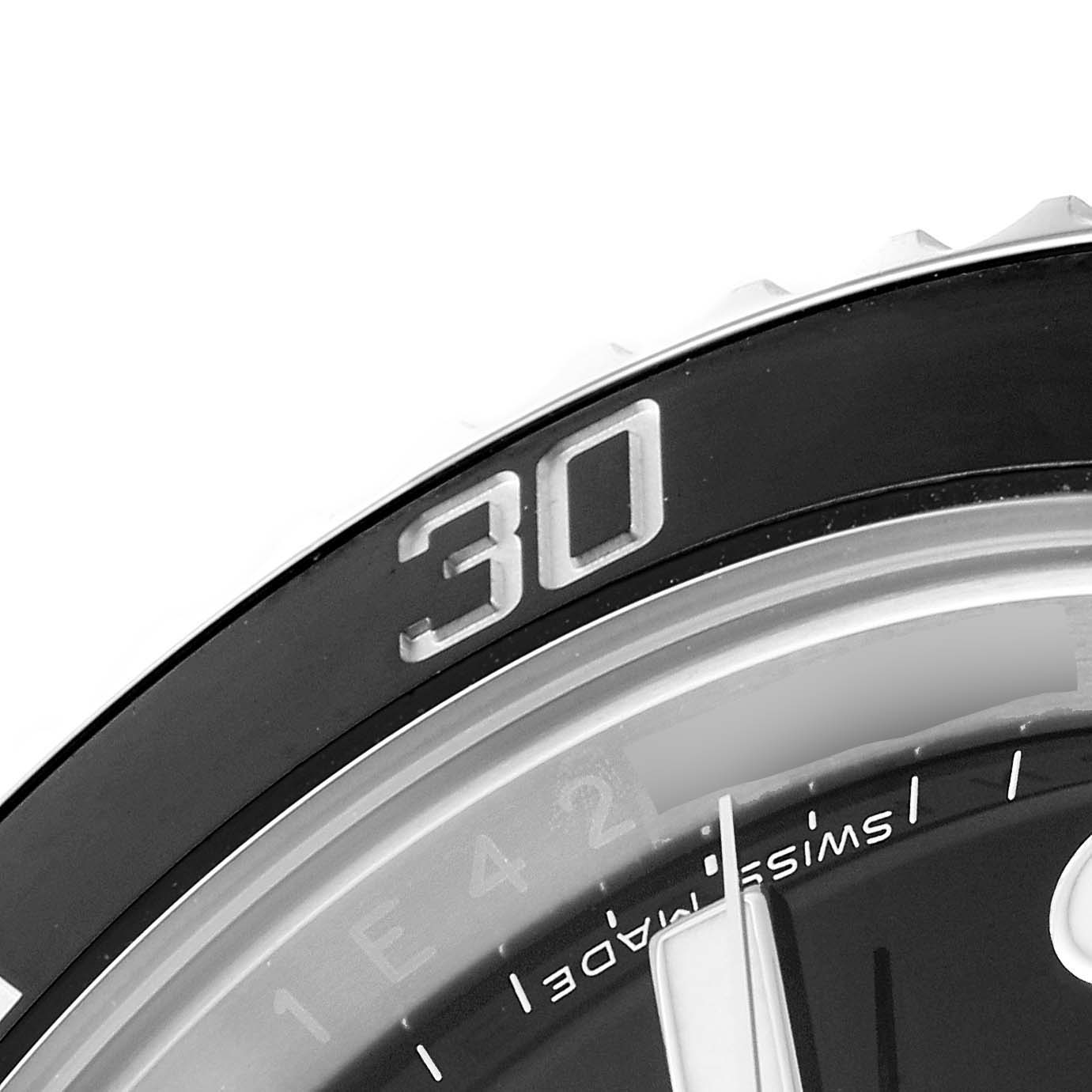 The image shows a close-up of the bezel and minute hand of a Rolex Submariner 116610LN Men
s Stainless Steel Black Dial 116610LN Men
s Stainless Steel Black Dial watch, focusing on the 30-minute mark.