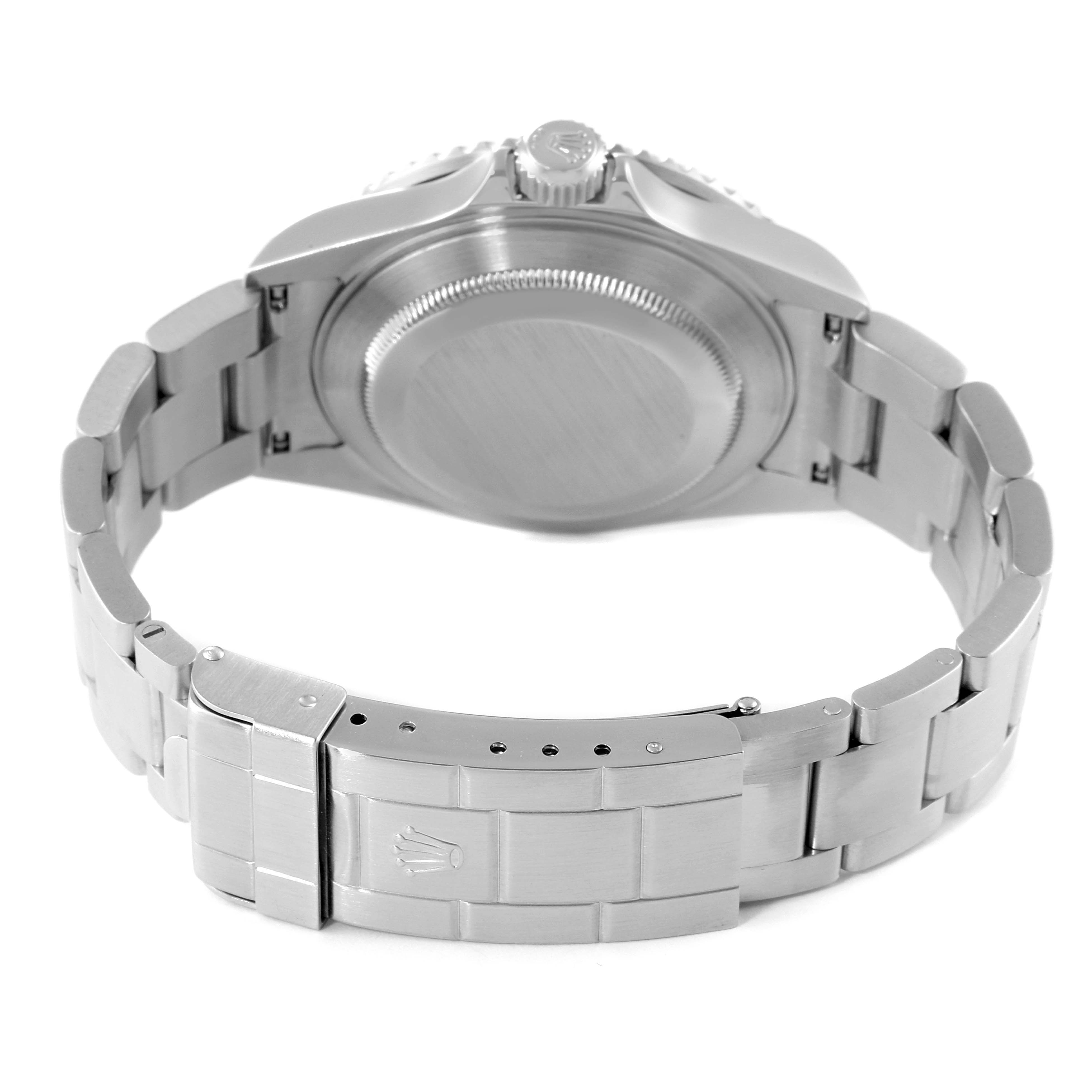 This image shows the back view of a Rolex Submariner 16610 Men's Stainless Steel Black Dial 16610 Men's Stainless Steel Black Dial, highlighting the case back, bracelet, and clasp.