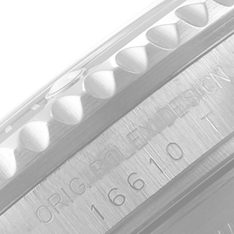 This image shows a close-up angle of the bezel and case side, revealing engravings on the Rolex Submariner 16610 Men's Stainless Steel Black Dial 16610 Men's Stainless Steel Black Dial model.