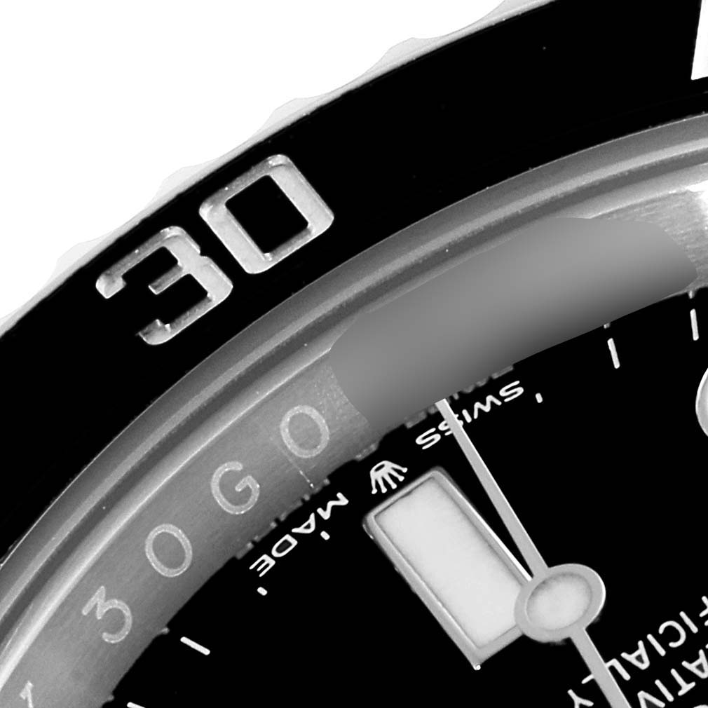 This image shows a close-up of the dial and bezel of a Rolex Submariner 124060 Men
s Stainless Steel Black Dial 124060 Men
s Stainless Steel Black Dial watch, highlighting the minute markers and the number 30 on the bezel.