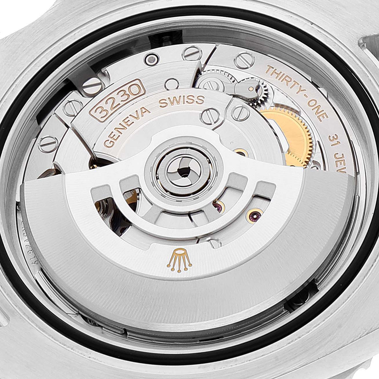 This image shows a close-up view of the movement of a Rolex Submariner 124060 Men
s Stainless Steel Black Dial 124060 Men
s Stainless Steel Black Dial, highlighting its intricate internal mechanisms.