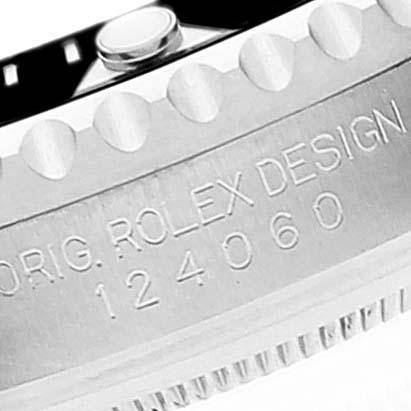 This image shows a close-up of the edge of the bezel and case engraving on a Rolex Submariner 124060 Men
s Stainless Steel Black Dial 124060 Men
s Stainless Steel Black Dial watch.