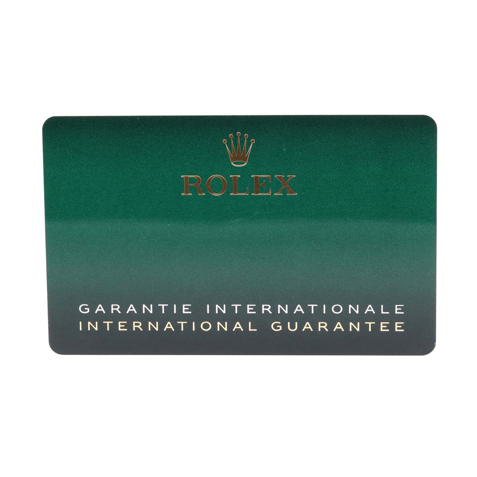 The image shows the international guarantee card of a Rolex Submariner 124060 Men
s Stainless Steel Black Dial 124060 Men
s Stainless Steel Black Dial watch.
