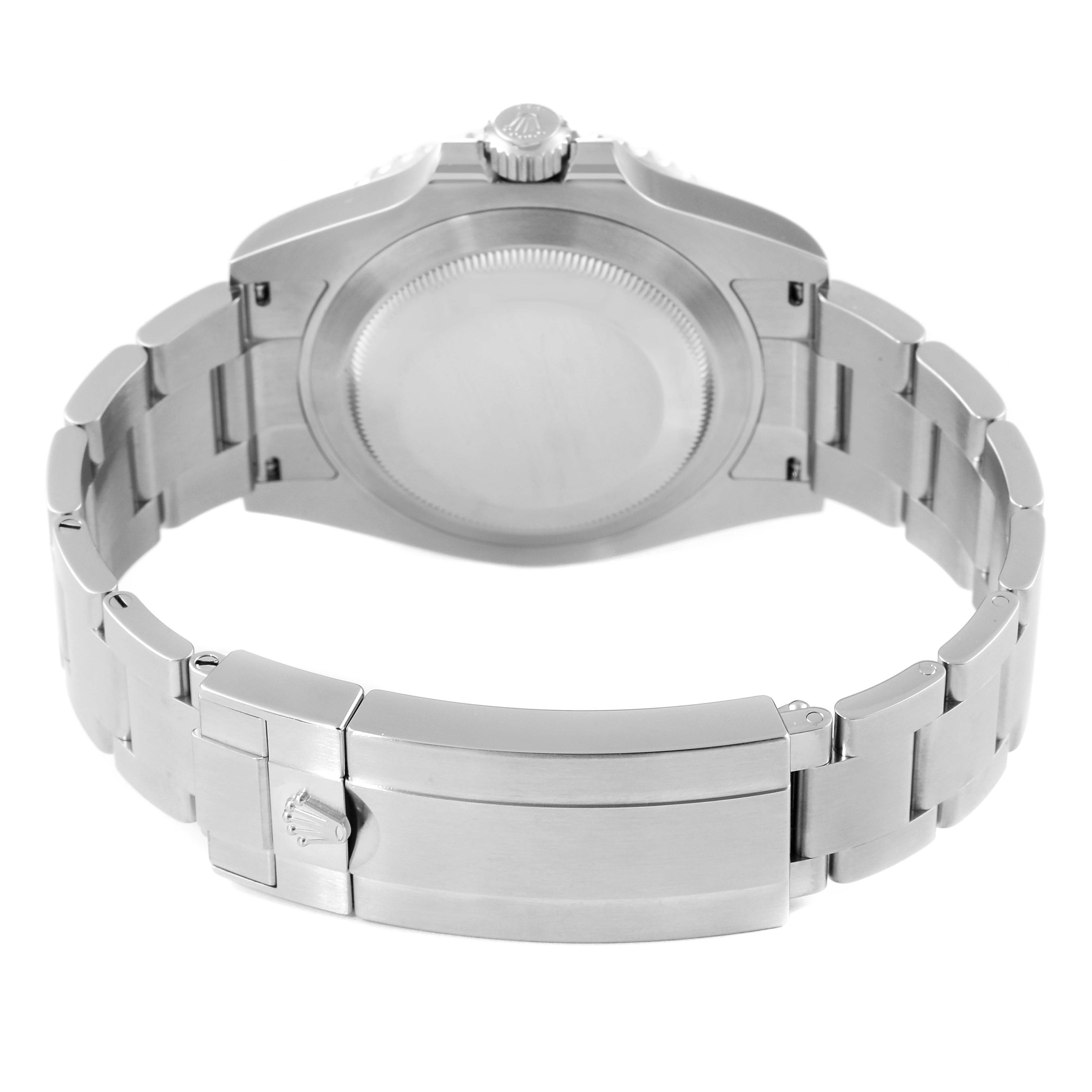 The image shows the backside of a Rolex Submariner 124060 Men
s Stainless Steel Black Dial 124060 Men
s Stainless Steel Black Dial watch, focusing on the case back and part of the bracelet with the clasp.