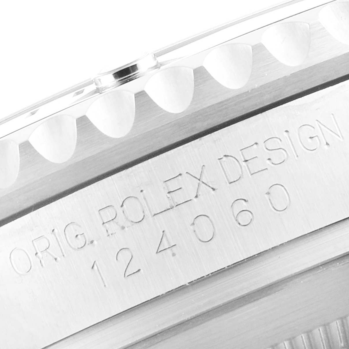 This close-up angle shows the side view of the watch case with "Orig. Rolex Design 124060" engraving on a Rolex Submariner 124060 Men
s Stainless Steel Black Dial 124060 Men
s Stainless Steel Black Dial.