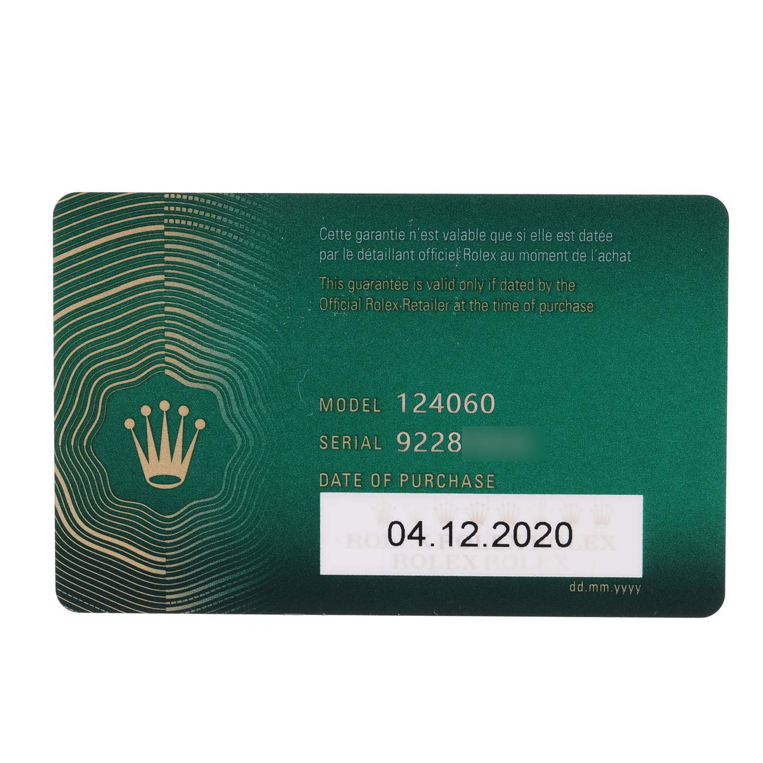 This is a warranty card for a Rolex Submariner 124060 Men
s Stainless Steel Black Dial 124060 Men
s Stainless Steel Black Dial model 124060, showing model, serial number, and date of purchase.