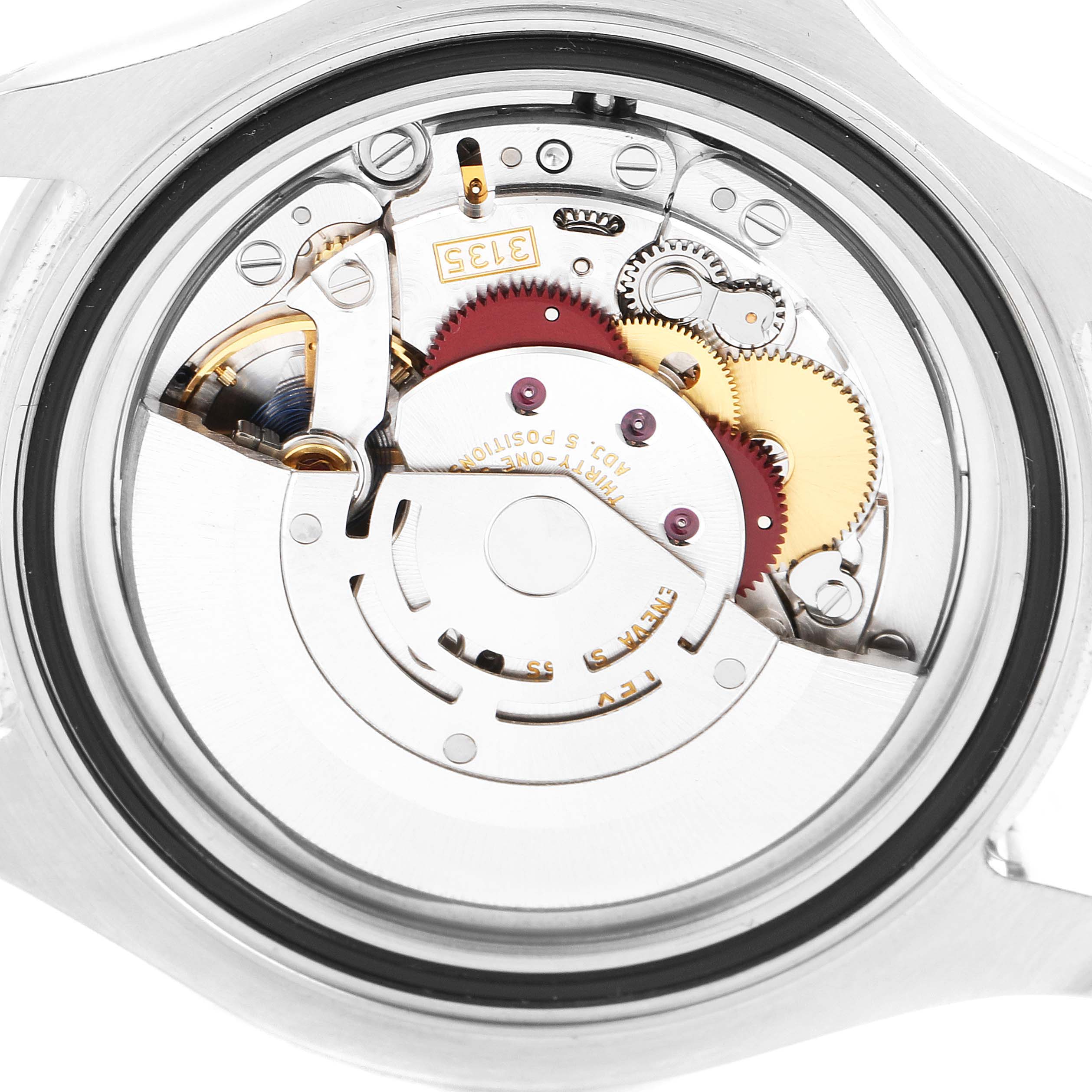 The image shows the internal movement mechanism of a Rolex Yacht-Master 116622 Men
s Stainless Steel Blue Dial 116622 Men
s Stainless Steel Blue Dial watch from a back angle.