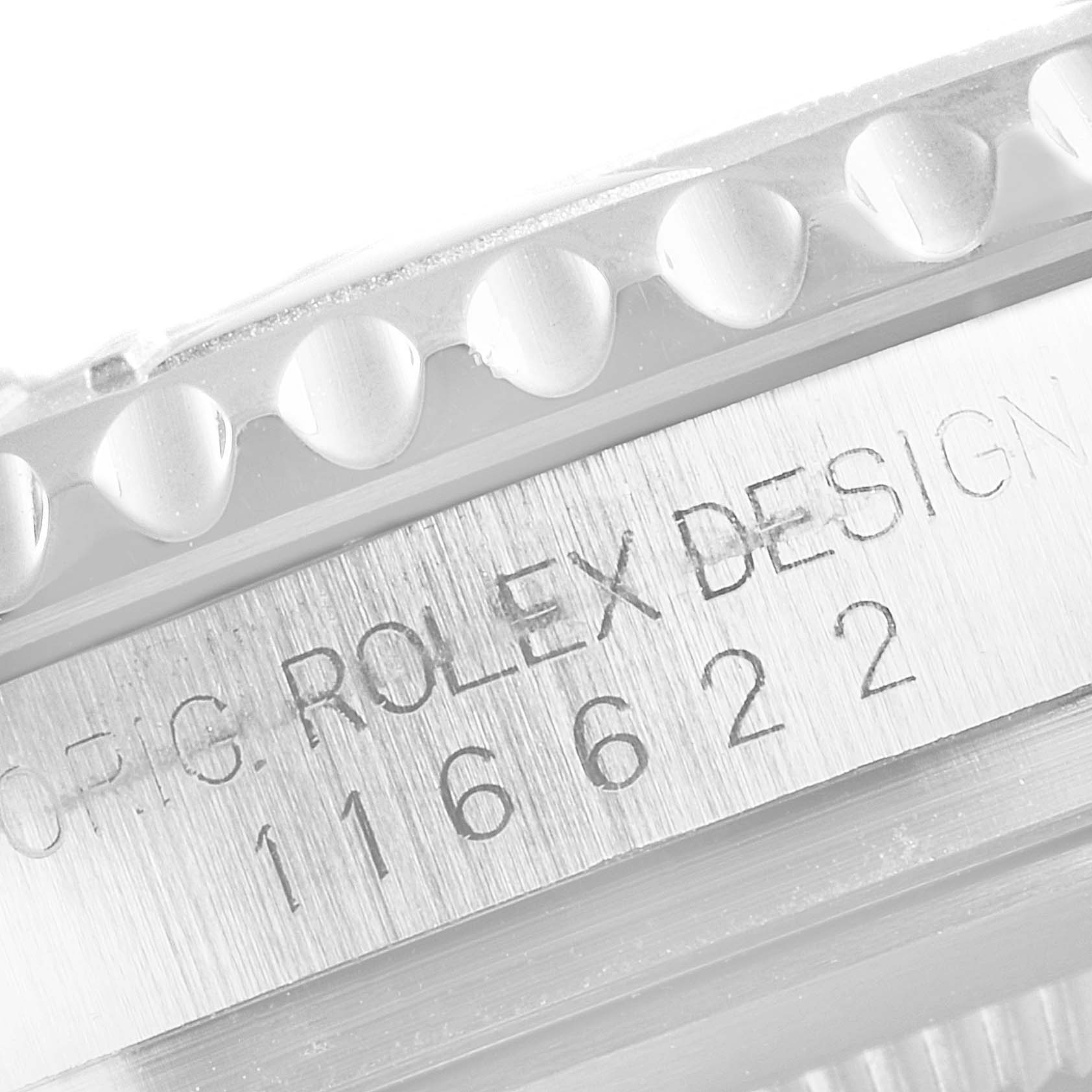 Close-up of the side of the Rolex Yacht-Master 116622 Men
s Stainless Steel Blue Dial 116622 Men
s Stainless Steel Blue Dial watch showing engraved serial numbers and part of the bezel.