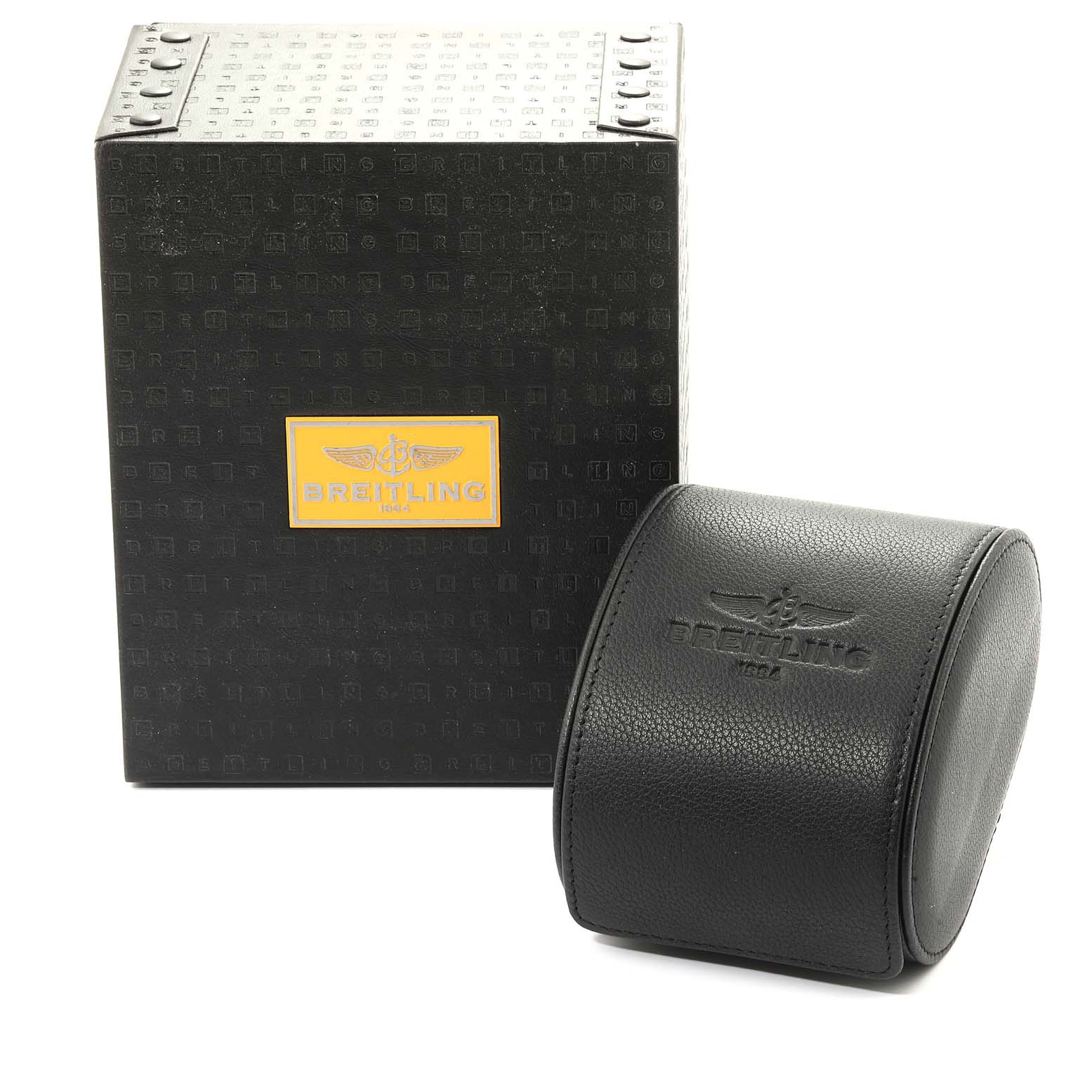 The image shows the packaging and protective case for a Breitling Bentley K25362  Men's Yellow Gold Black Dial K25362  Men's Yellow Gold Black Dial model watch from a front angle.