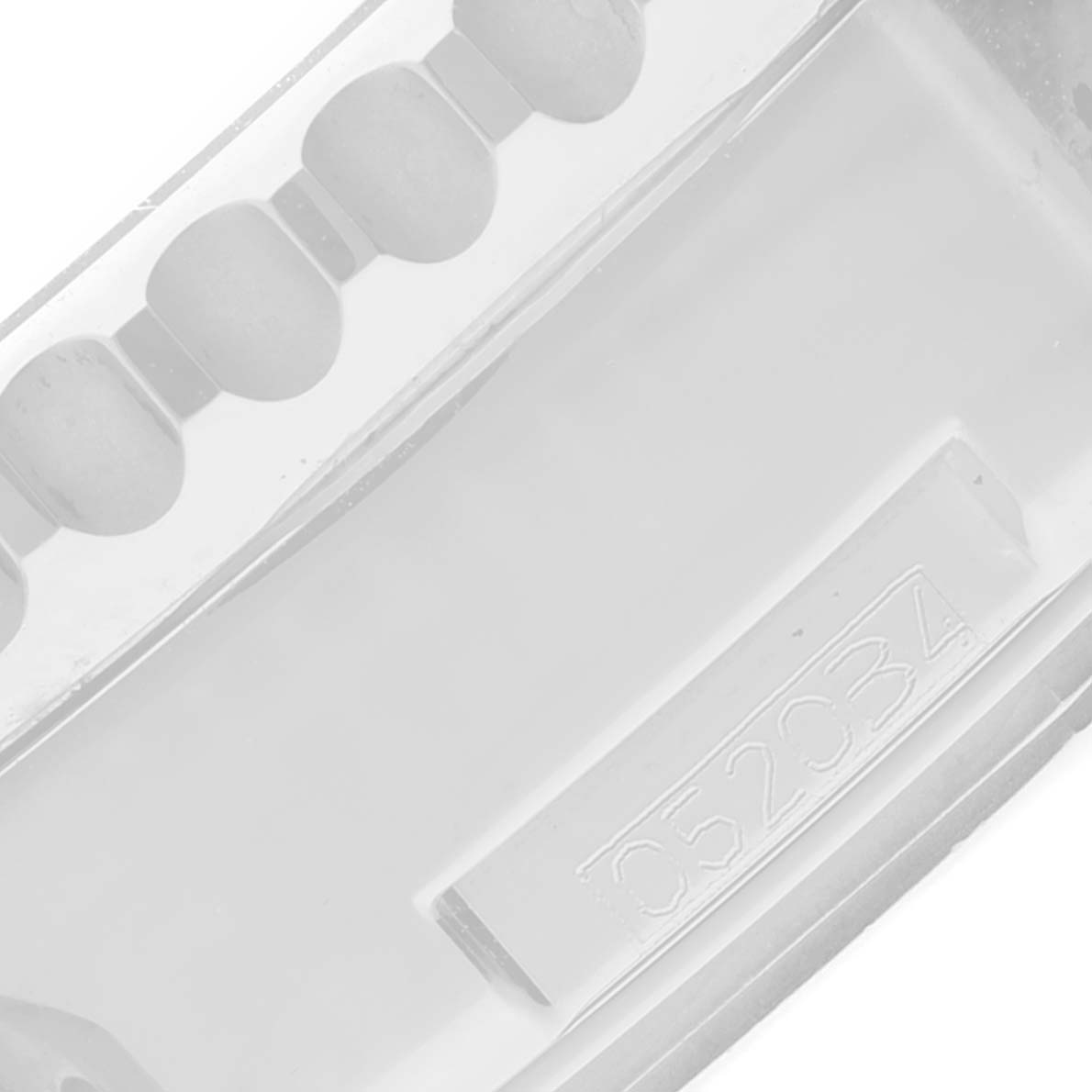 This image shows a close-up of the Breitling Navitimer AB0127 Men's Stainless Steel Blue Dial AB0127 Men's Stainless Steel Blue Dial watch model's strap detail and part of its serial number.