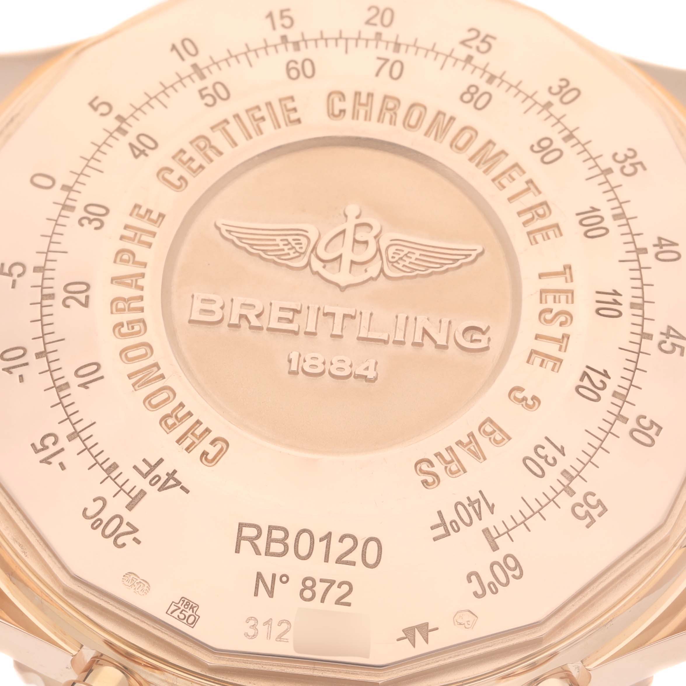 This image shows the case back of a Breitling Navitimer RB0120 Men
s Rose Gold Black Dial RB0120 Men
s Rose Gold Black Dial model, displaying detailed engravings and serial numbers.