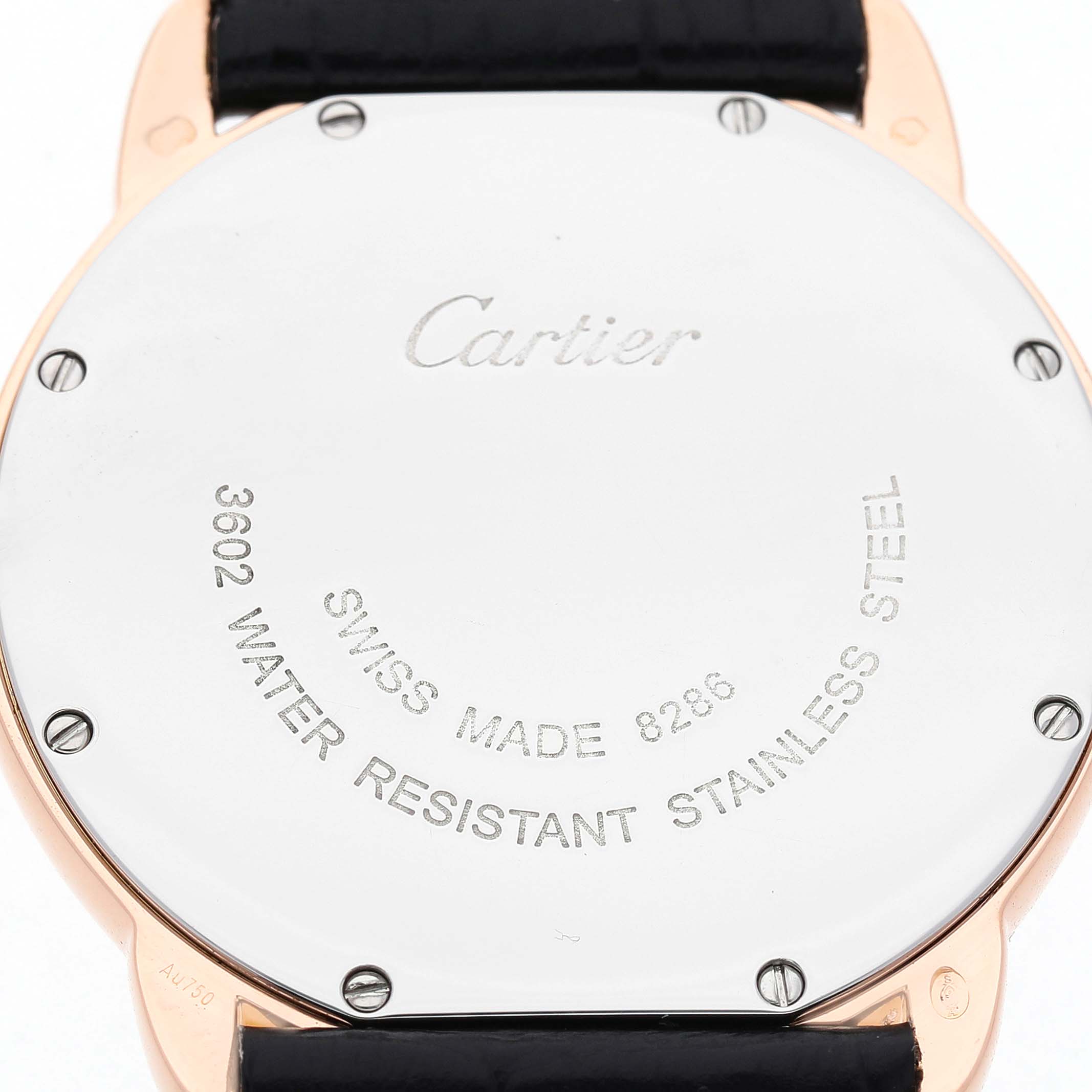 The image shows the back of a Cartier Ronde W6701008 Men's Rose Gold Silver Dial watch, featuring the brand name and specifications engraved on the case.