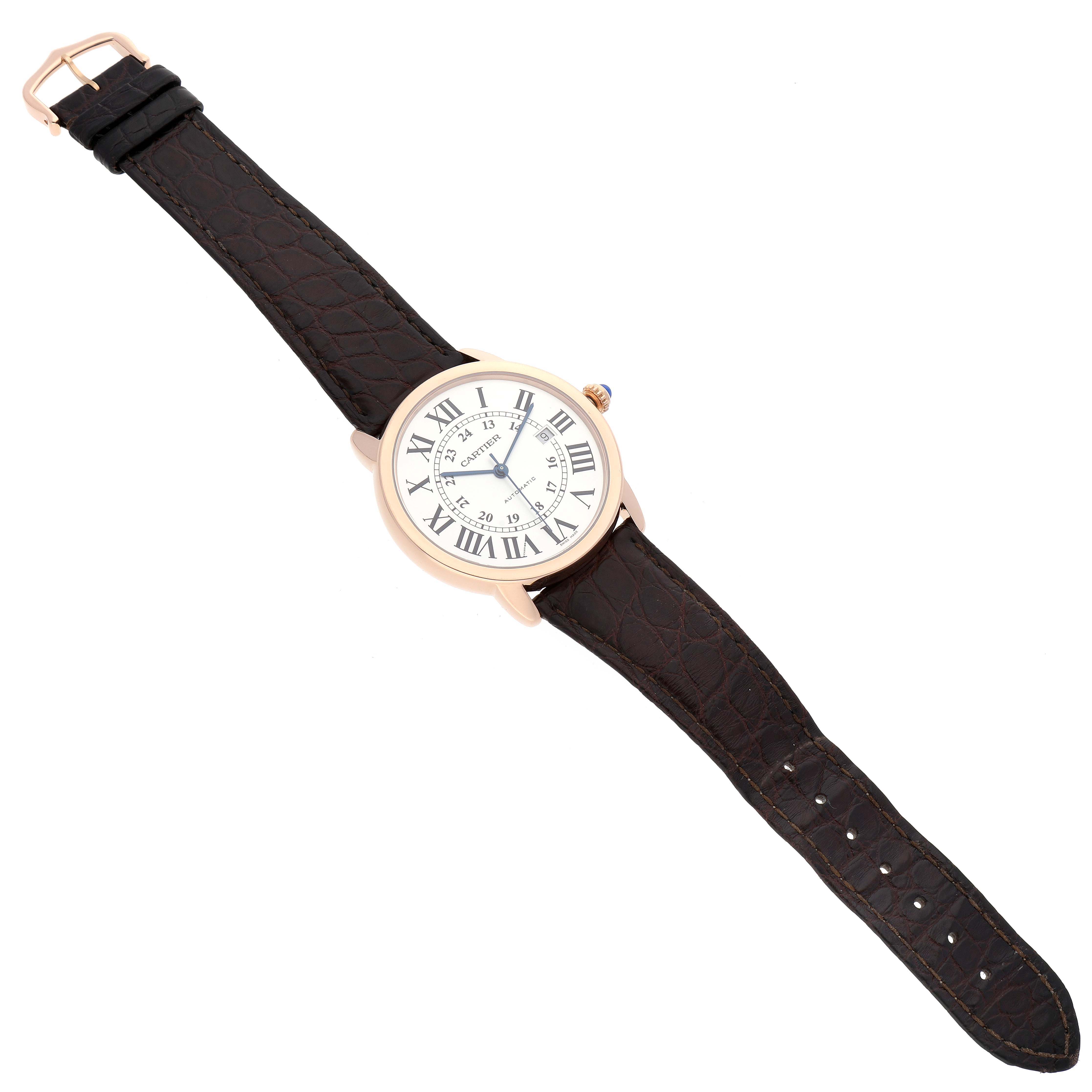 The Cartier Ronde W6701009 Men
s Rose Gold Silver Dial W6701009 Men
s Rose Gold Silver Dial watch is shown with a full view of its dial and straps, captured from a top-down angle.