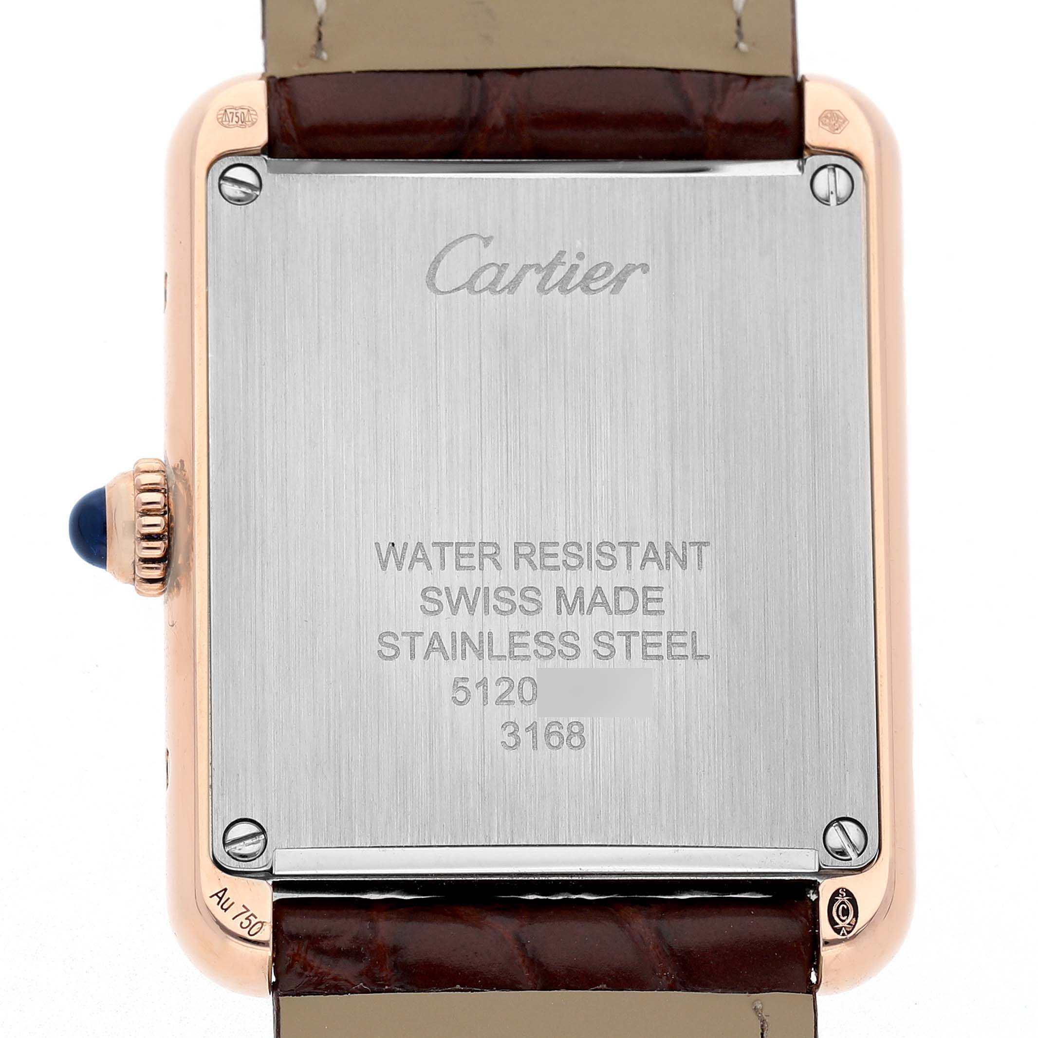The image shows the back case of a Cartier Tank Solo W5200002 Women's Steel and Gold (two tone) Silver Dial watch, displaying the brand name and specifications.