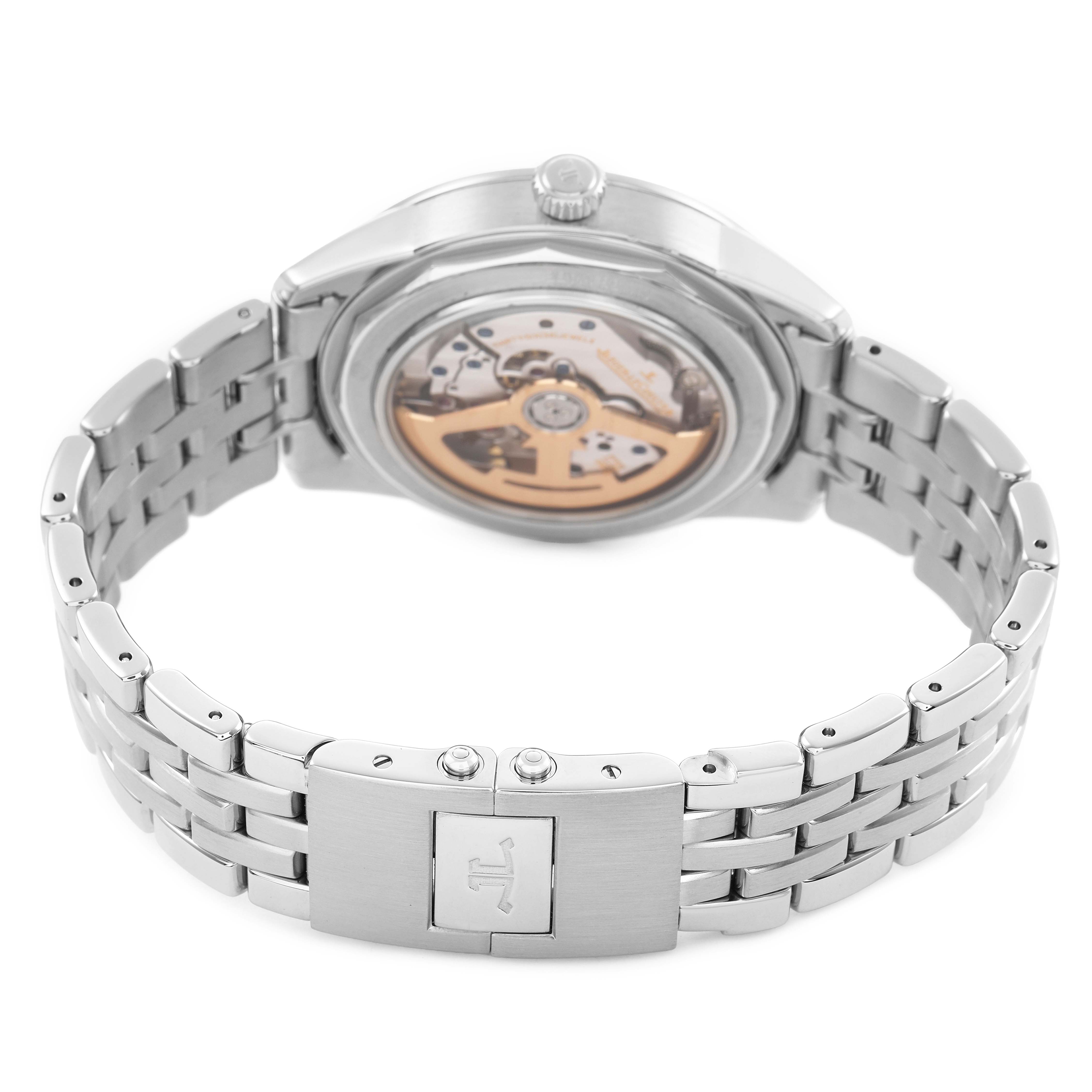 The Jaeger LeCoultre Geophysic Q8108420 Men's Stainless Steel Blue Dial watch is shown from the back, highlighting the open case back and metal bracelet.
