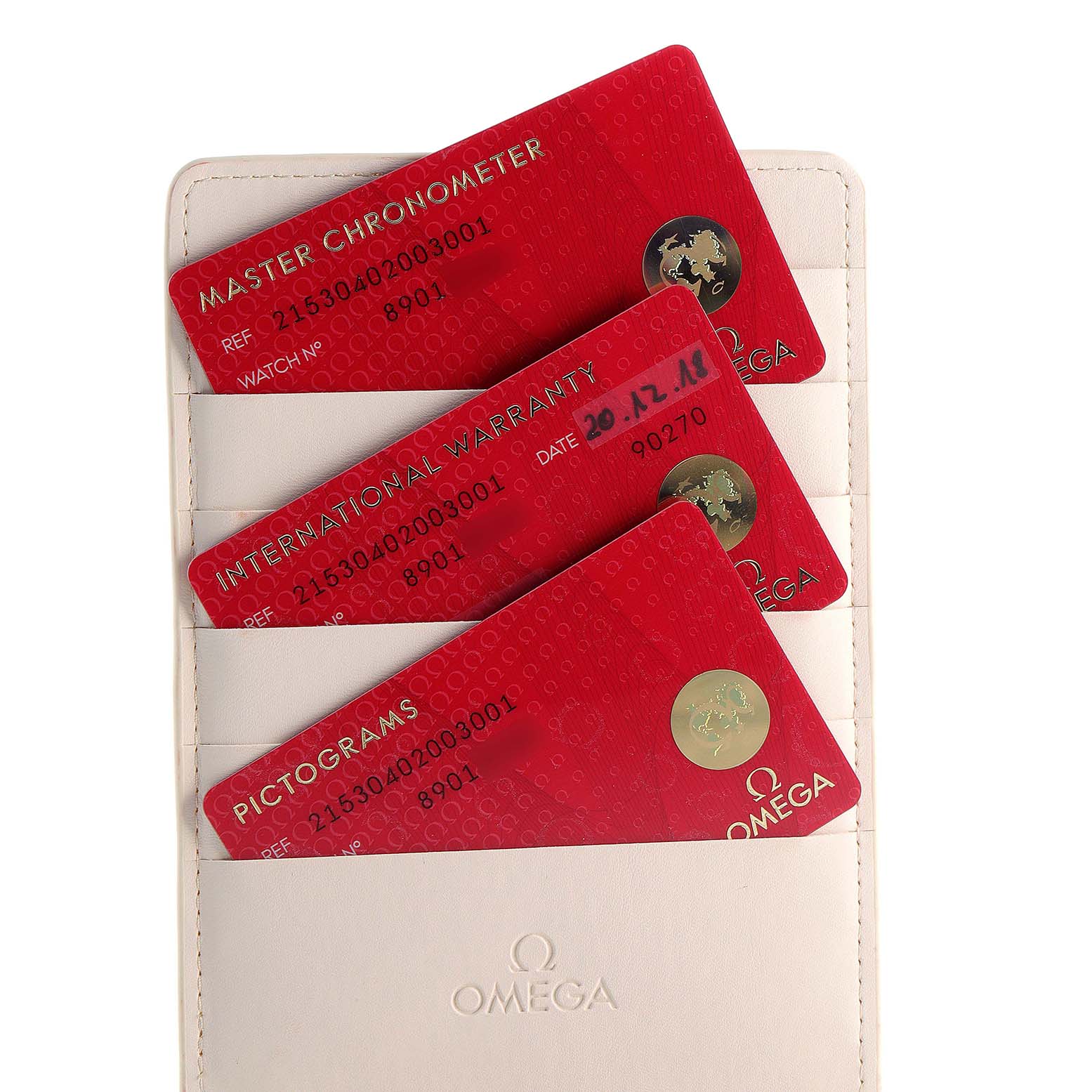 This image shows three red cards (Master Chronometer, International Warranty, Pictograms) for the Omega Planet Ocean 215.30.40.20.03.001 Men
s Stainless Steel Blue Dial 215.30.40.20.03.001 Men
s Stainless Steel Blue Dial model.